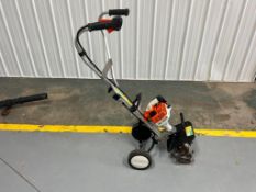 Stihl Yard Boss Cultivator, Model M55, 27.2 cc Engine, Cultivates 8.5" Wide. Located in Mt. Pleasant