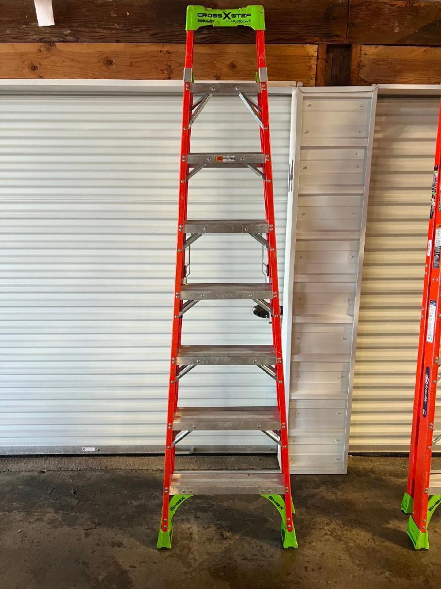 12' Louisville CrossXstep Step Ladder, Model FXS1508, 300# Load Capacity. Located in Mt. Pleasant, I - Image 2 of 5