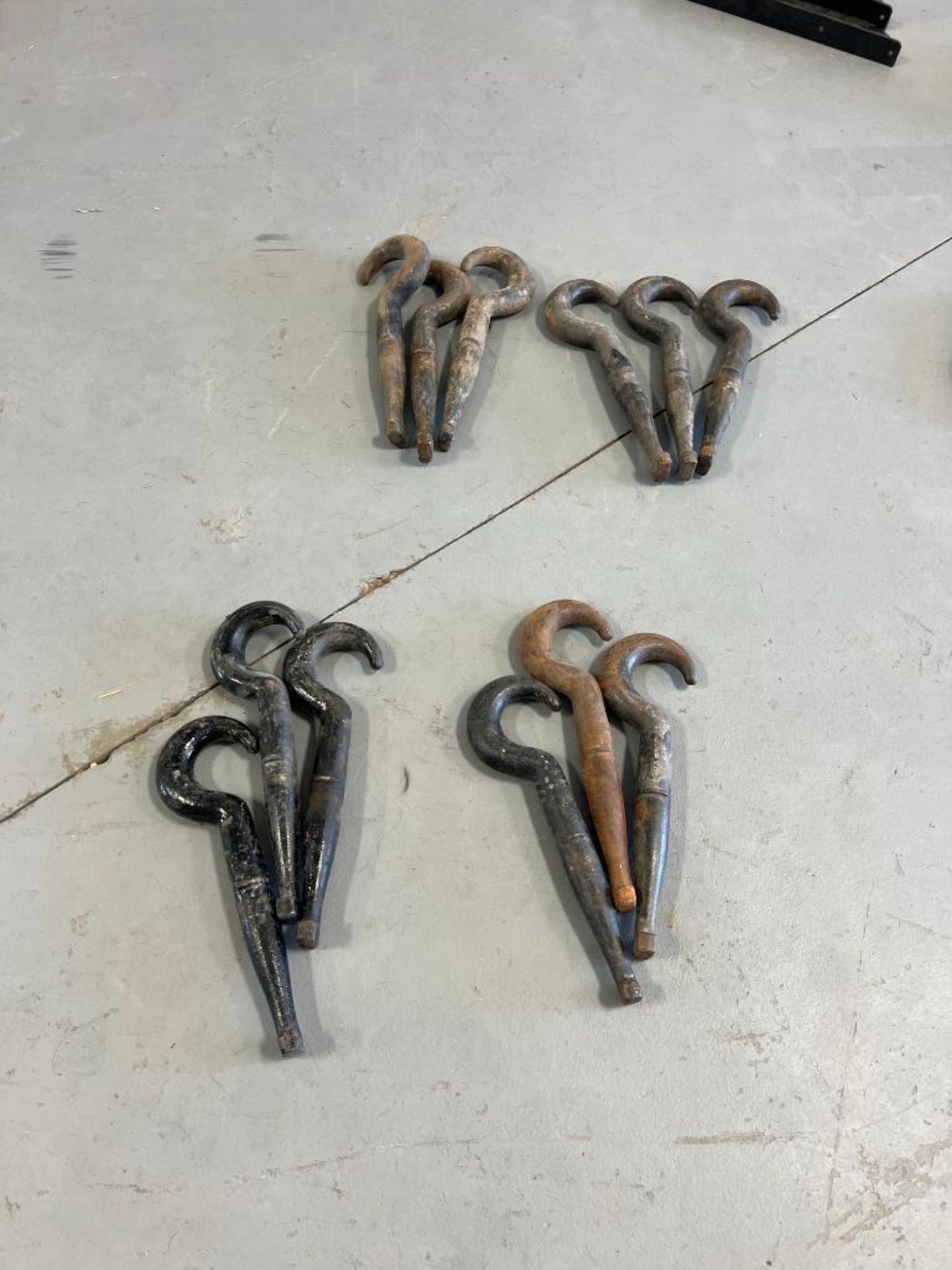 (12) Freightliner Tow Hooks. Located in Mt. Pleasant, IA