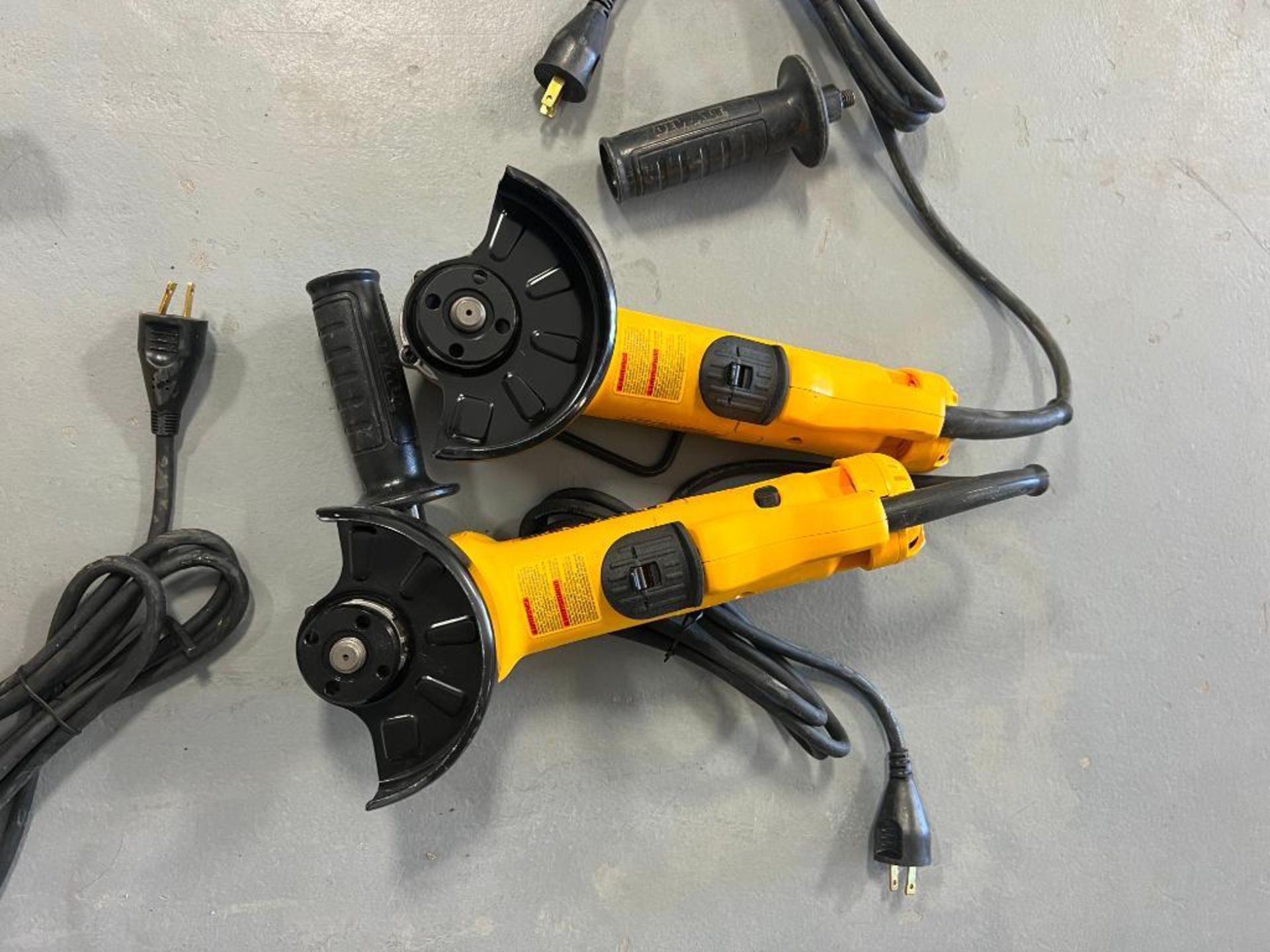 (2) DeWalt DWE402, 4 1/2" Angle Grinders, 120 V. Located in Mt. Pleasant, IA