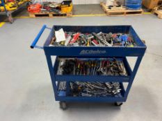 Blue Rolling 3 Shelf Cart with Contents. Located in Mt. Pleasant, IA
