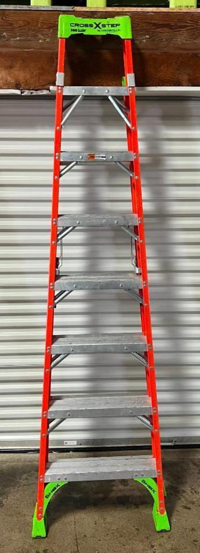 12' Louisville CrossXstep Step Ladder, Model FXS1508, 300# Load Capacity. Located in Mt. Pleasant, I