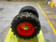 (2) Bobcat Tire and Rim, Hercules Xtra-Wall 12-16.5 Tire. Located in Mt. Pleasant, IA