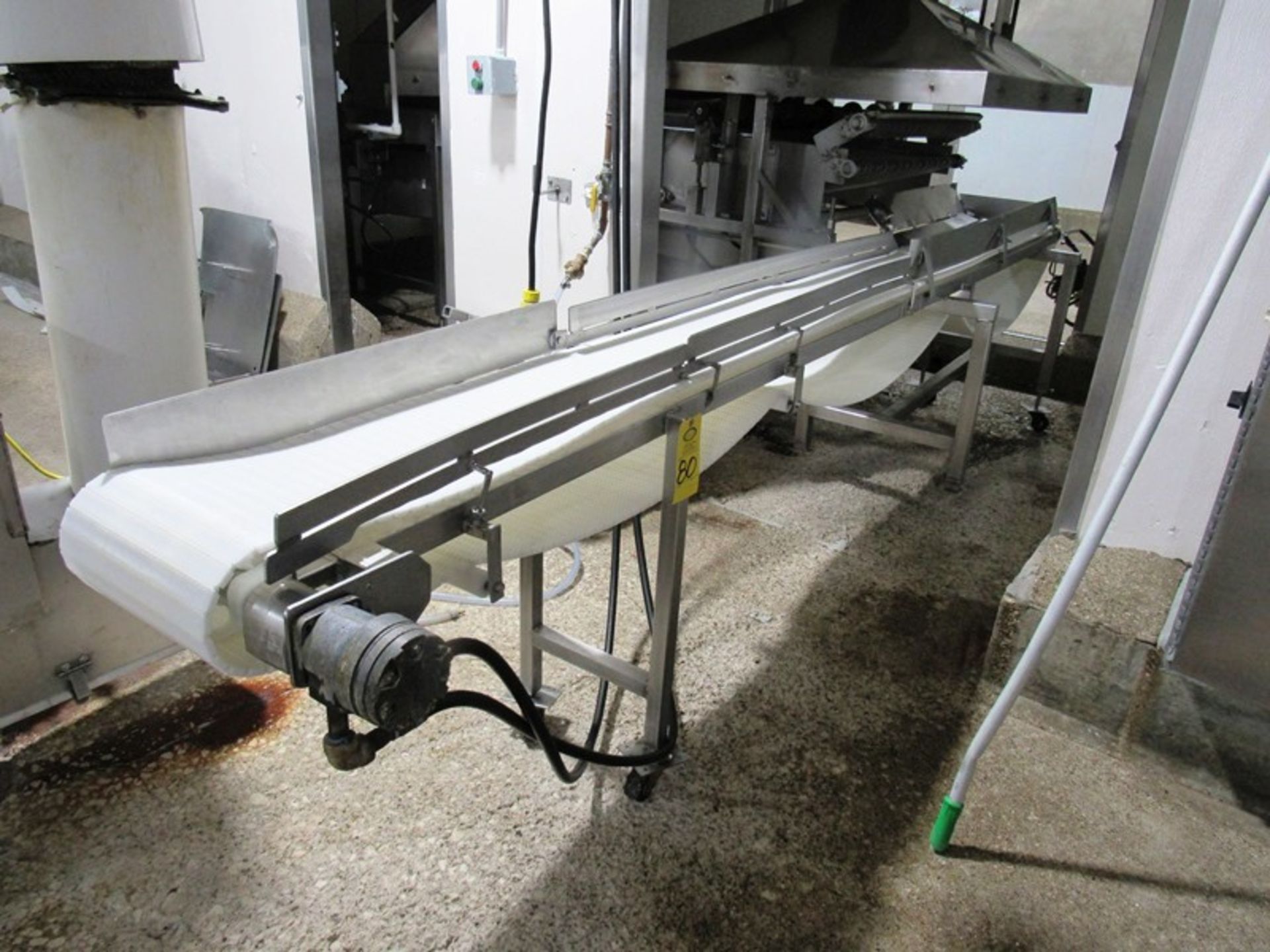 Portable Conveyor, 12" W X 14' plastic belt, hydraulic operation Removal: By Appointment Only.