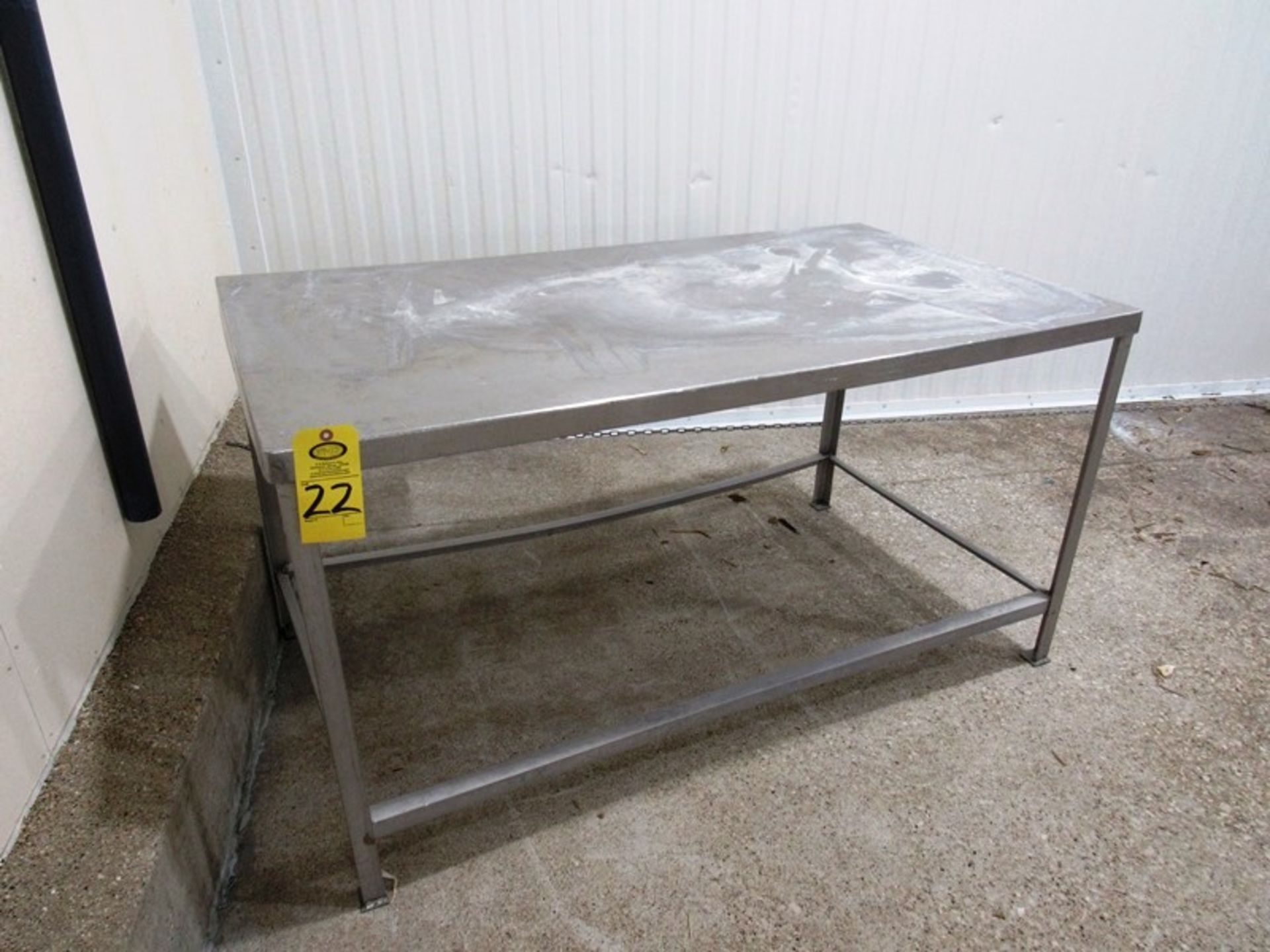 Stainless Steel Table, 34" W X 63" L Removal: By Appointment Only. Required Rigging Fee $25.00 .