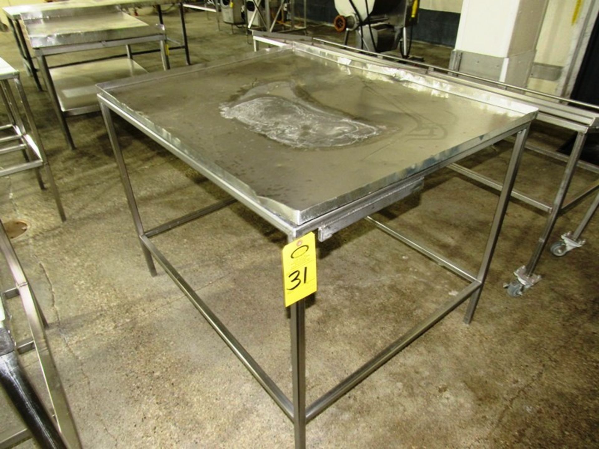 Stainless Steel Table, 36" W X 46" L Removal: By Appointment Only. Required Rigging Fee $25.00 .