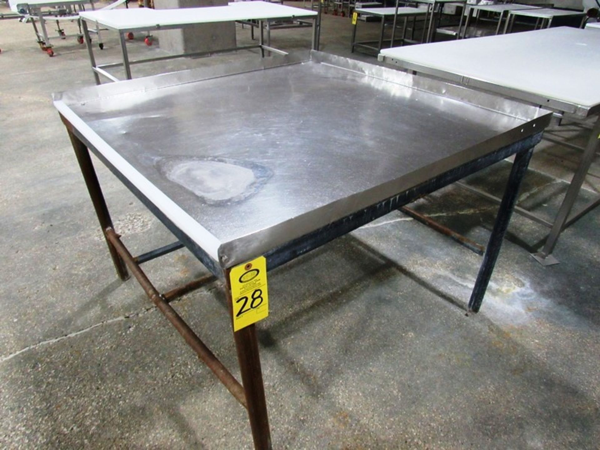 Mild Steel Table with stainless steel top, 4' W X 4' L Removal: By Appointment Only. Required