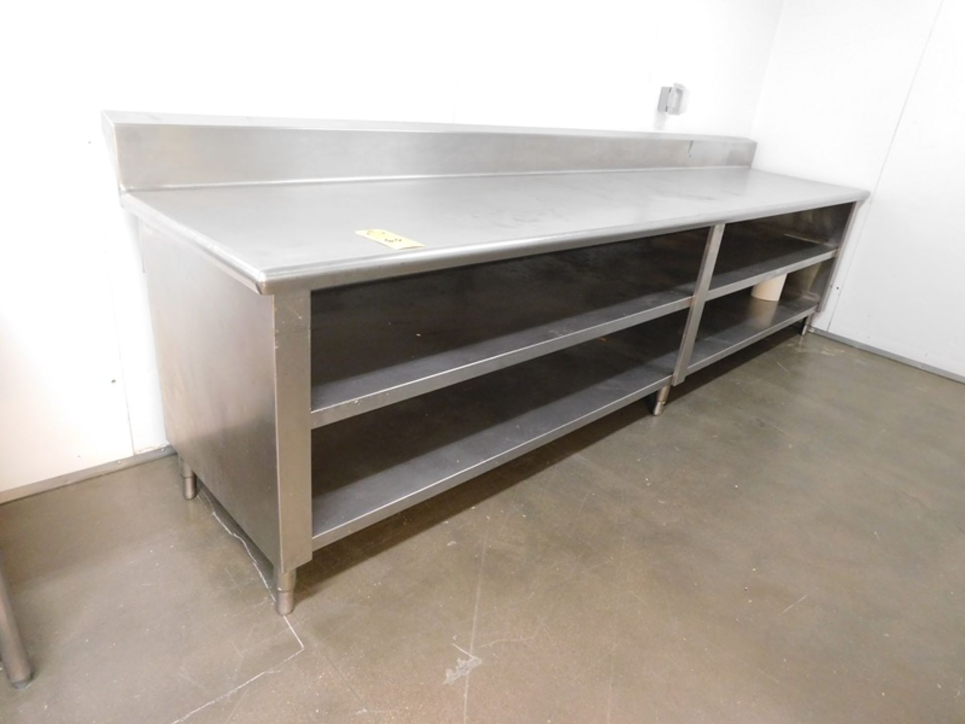 Stainless Steel Table with 6" backsplash and two stainless steel shelves, 141" X 30" X 34" -(