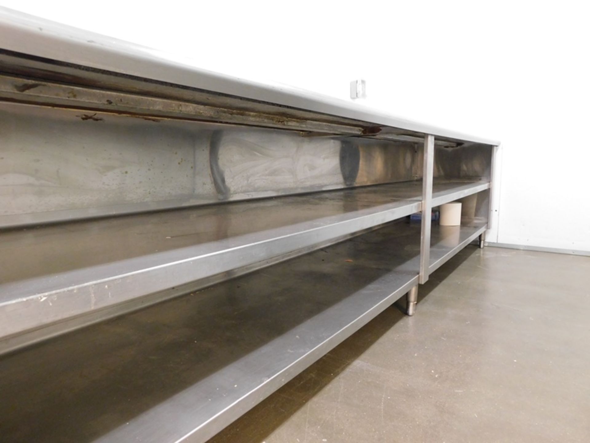 Stainless Steel Table with 6" backsplash and two stainless steel shelves, 141" X 30" X 34" -( - Image 2 of 2