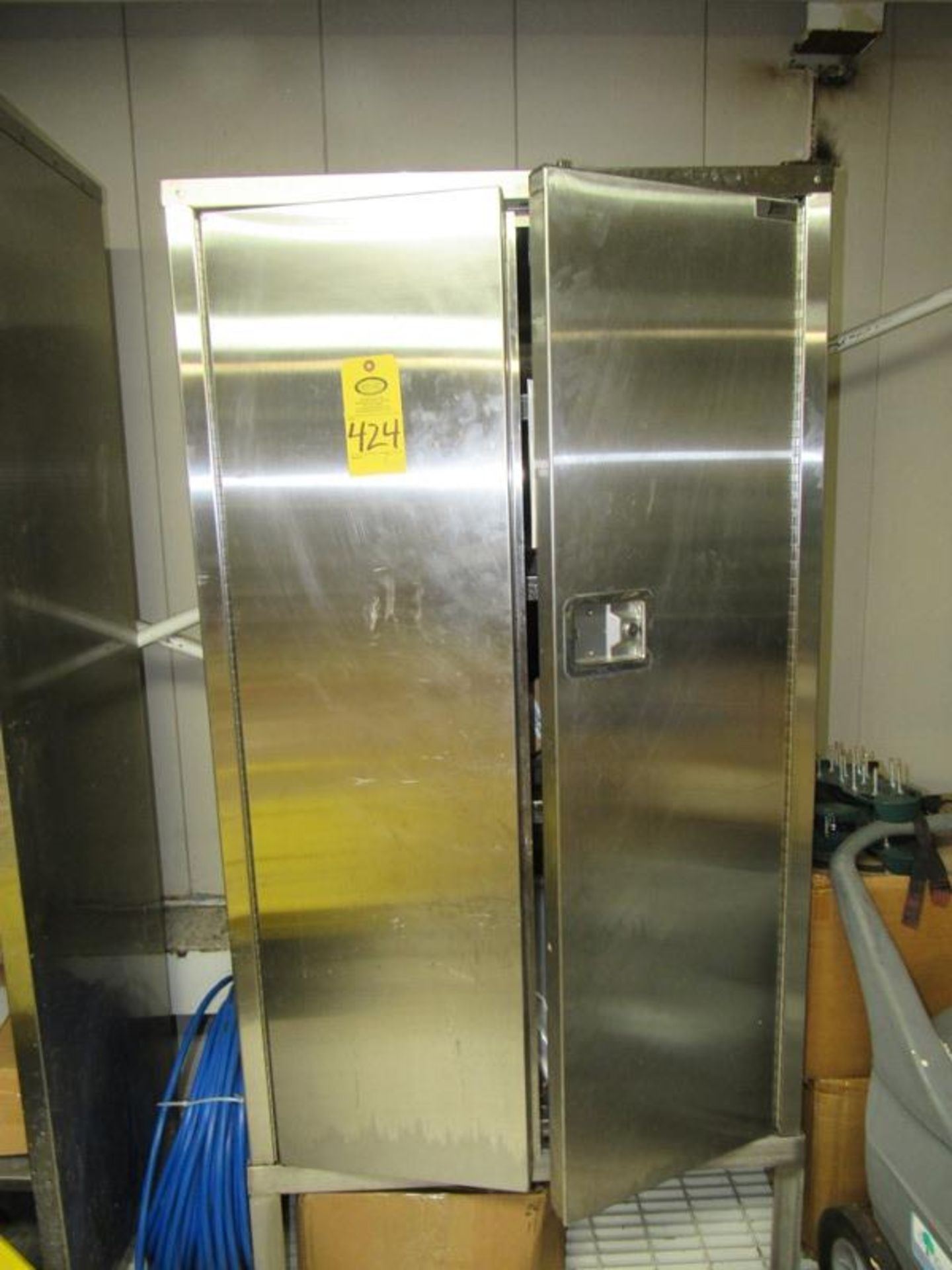 Jamco Stainless Steel Cabinet, 36" W X 18" D X 5' T on stand and contents, broken latch (Required