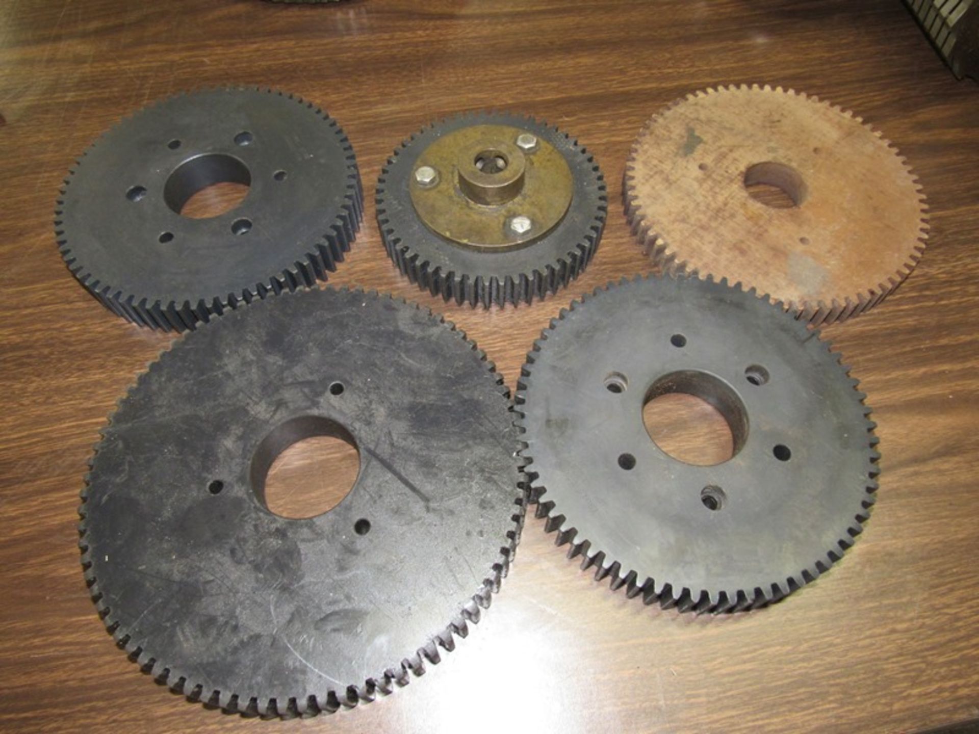 Lot of (5) Urschel Plastic Gears, (2) 7" dia., 2" dia. shaft, (1) 7" dia., 1 1/2" dia. shaft, (1) 8