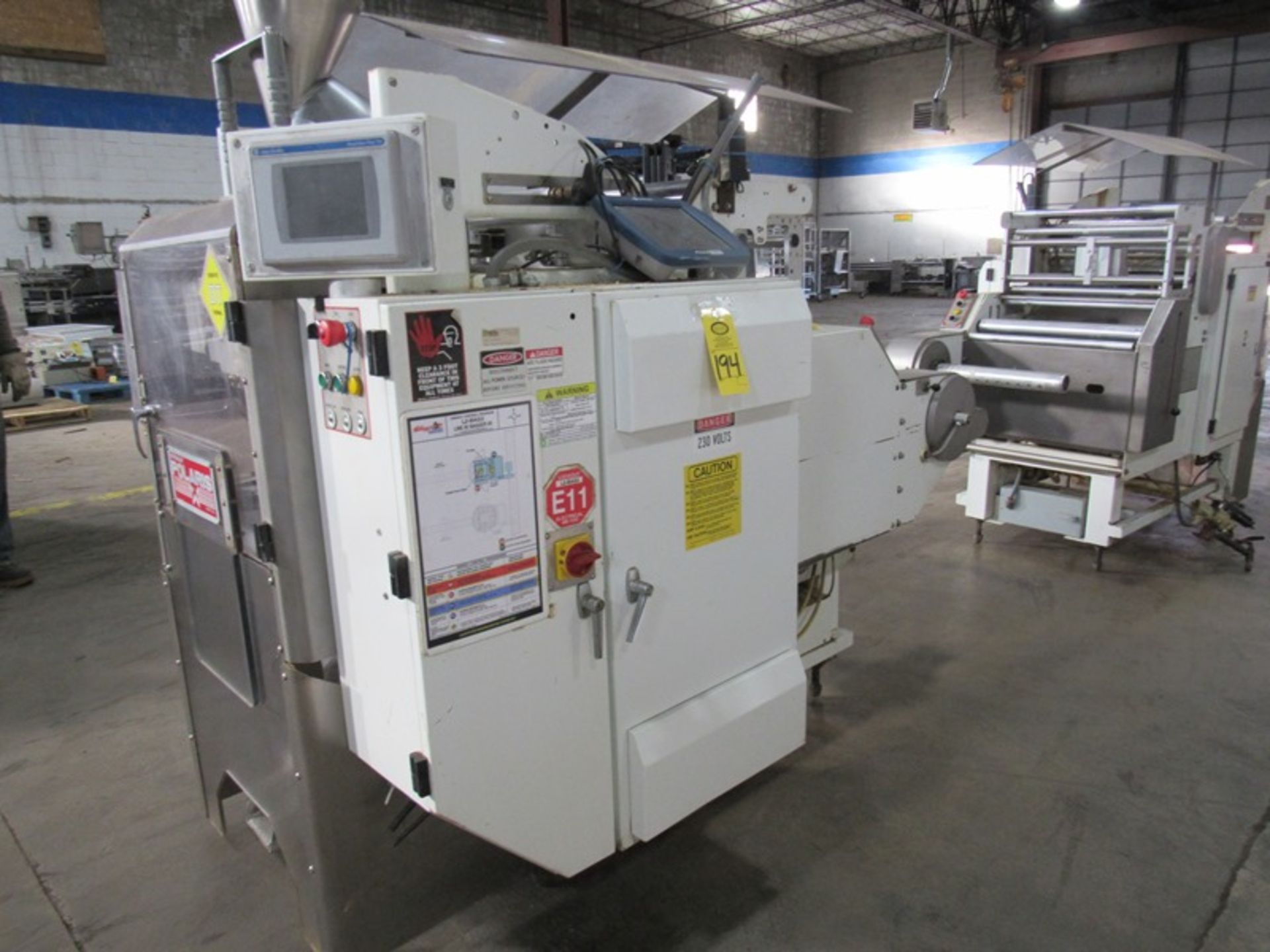 Woodman Mdl. PLBA125LN04086-90-15XX Polaris Vertical Form, Fill & Seal Packager, 230 volts, 1 phase,