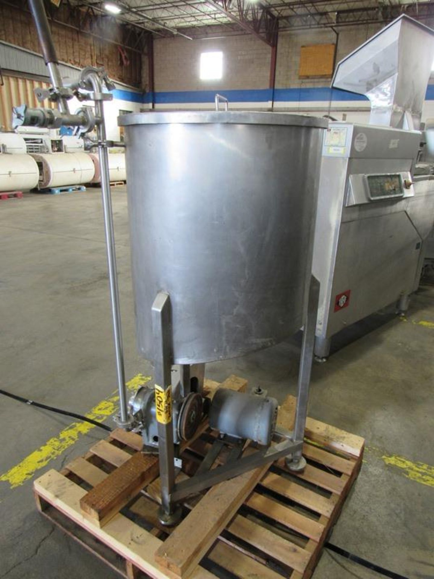 Stainless Steel Tank, 24" dia. X 25" deep, slanted bottom with pump, size 10, Ser. #076748SS, 1/2