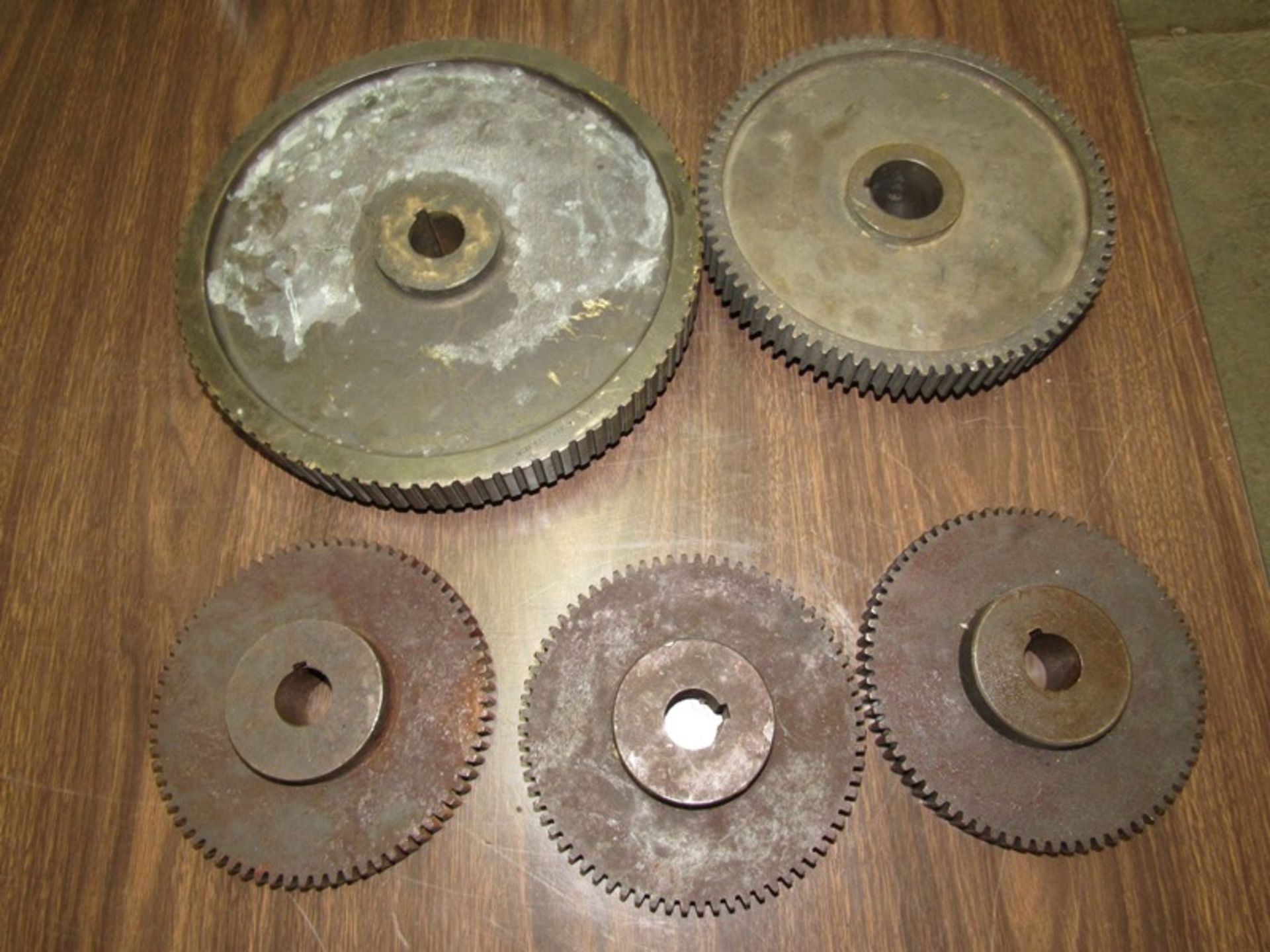 Lot of (5) Urschel Steel Gears, (3) 6 1/4" dia., 2" dia. shaft, (1) 8 1/2" dia., 1 1/2" dia. shaft,