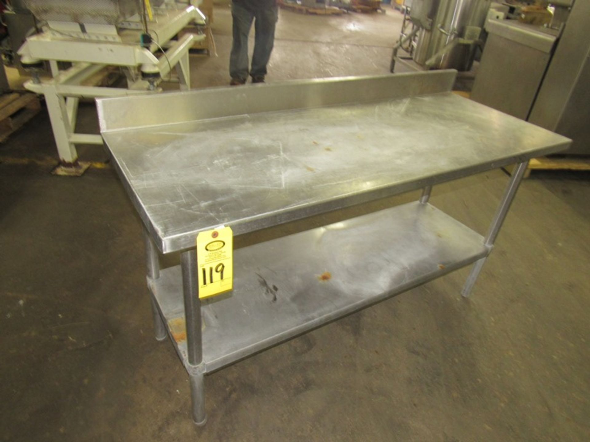 Stainless Steel Table, 24" W X 5' L X 33" T (Required Loading Fee $25- Pickup by Appointment Only)