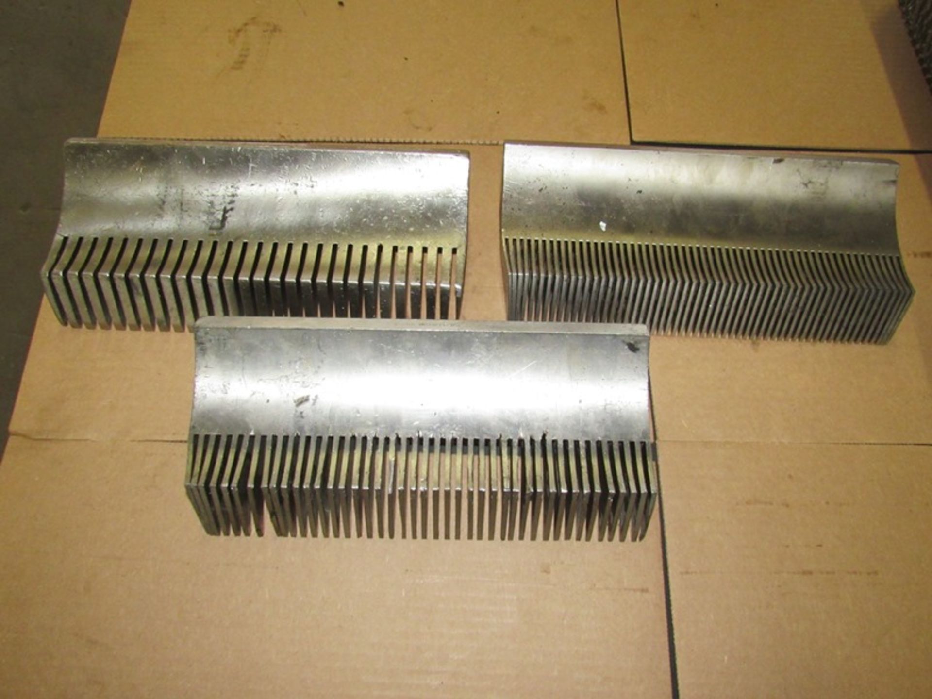 Lot of (3) Urschel Blade Stripper Plates, 10 9/16" long, (1) 1/4" spacing, (1) 1/8" spacing, (1) 1