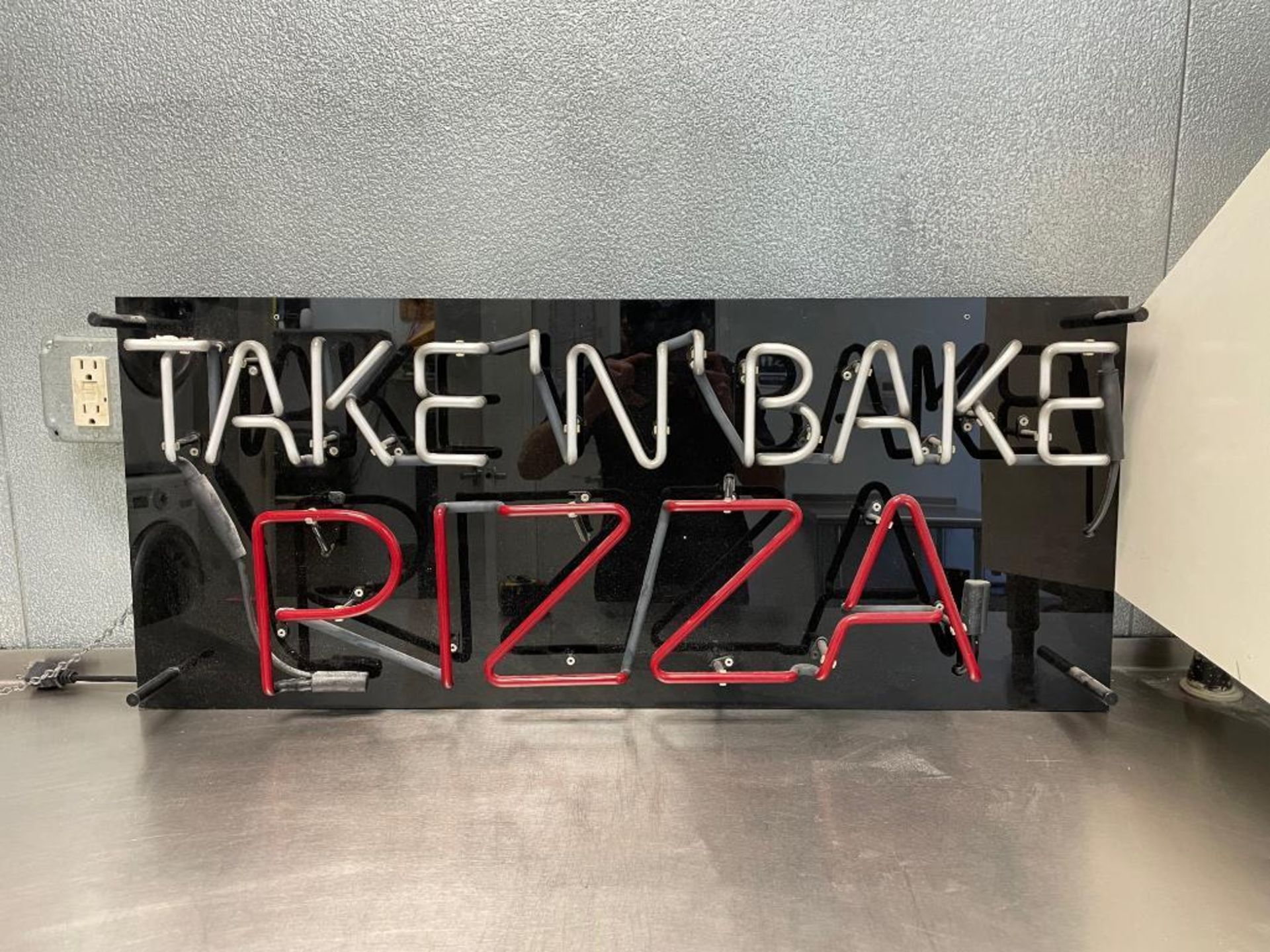 DESCRIPTION: TAKE AND BAKE NEON SIGN. ADDITIONAL INFORMATION NOT IN WORKING ORDER LOCATION: 2500 S C