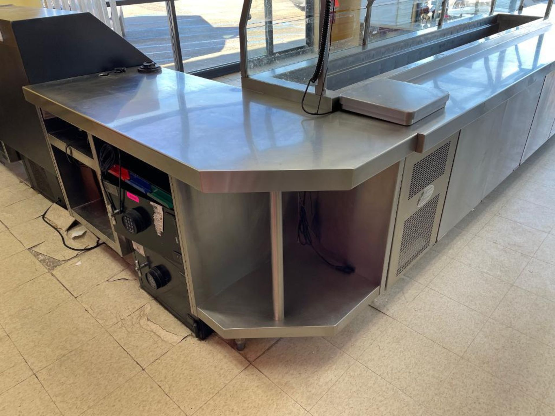 DESCRIPTION: (3) SECTIONS OF STAINLESS SALES COUNTER / CABINETS. W/ ELECTRICAL OUTLETS. ADDITIONAL I