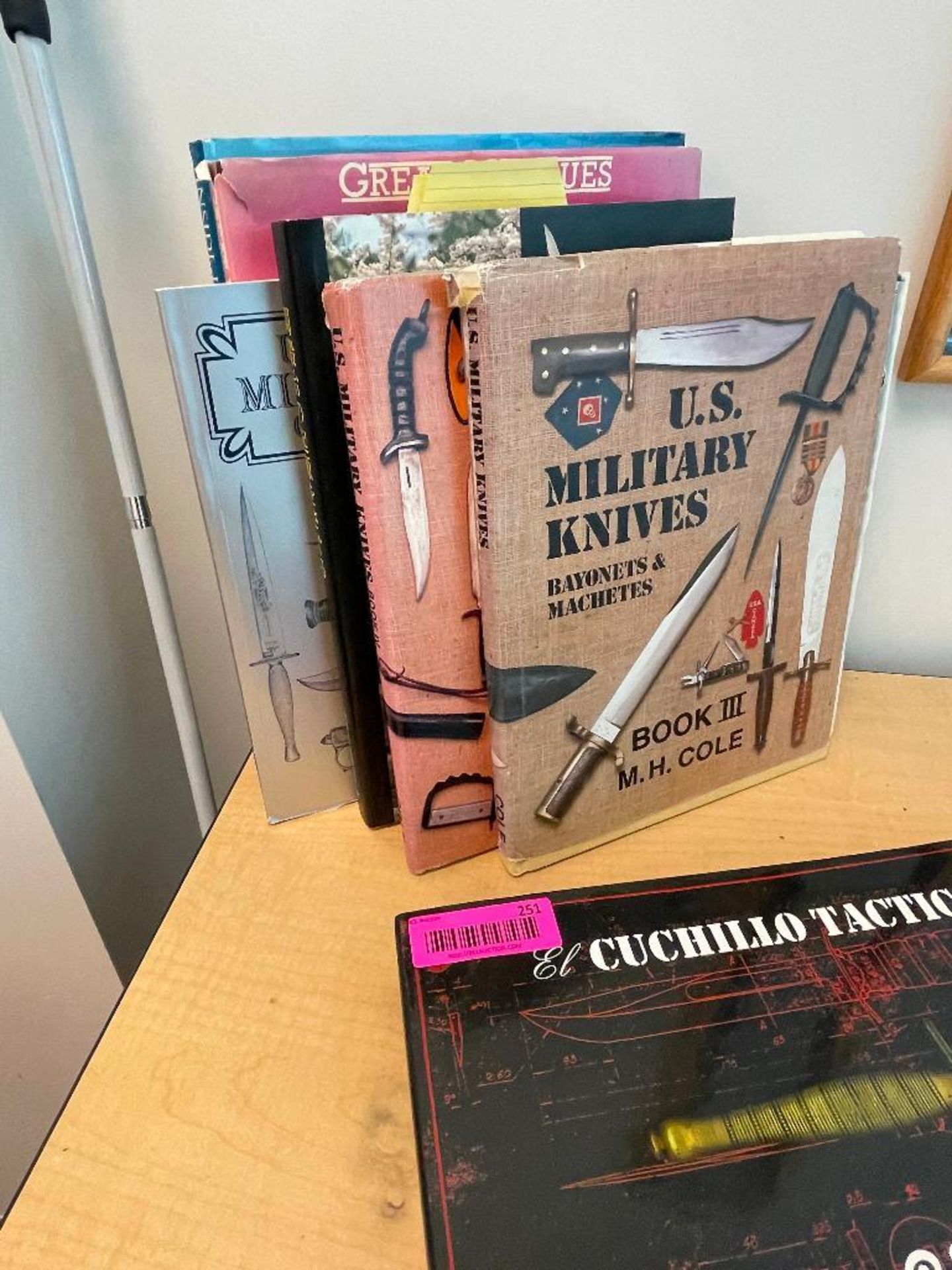 DESCRIPTION: (1) LOT OF ASSORTED MILITARY BOOKS. LOCATION: OFFICE SECOND FLOOR THIS LOT IS: ONE MONE