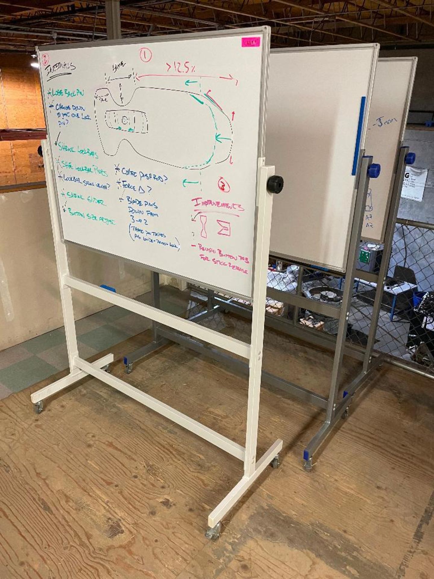 DESCRIPTION: (3) 4' X 3' DRY ERASE BOARDS W/ ROLL ABOUT STANDS. LOCATION: UPSTAIRS SHOP THIS LOT IS: