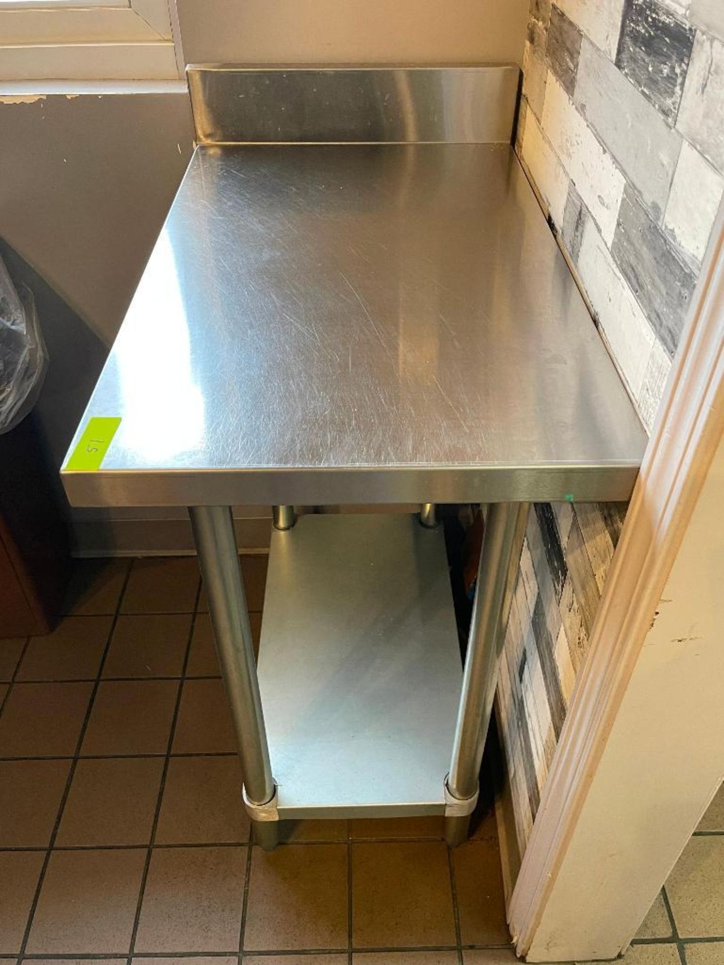 DESCRIPTION: 30" X 18" STAINLESS TABLE W/ 4" BACK SPLASH SIZE 30" X 18" LOCATION: COUNTER QTY: 1