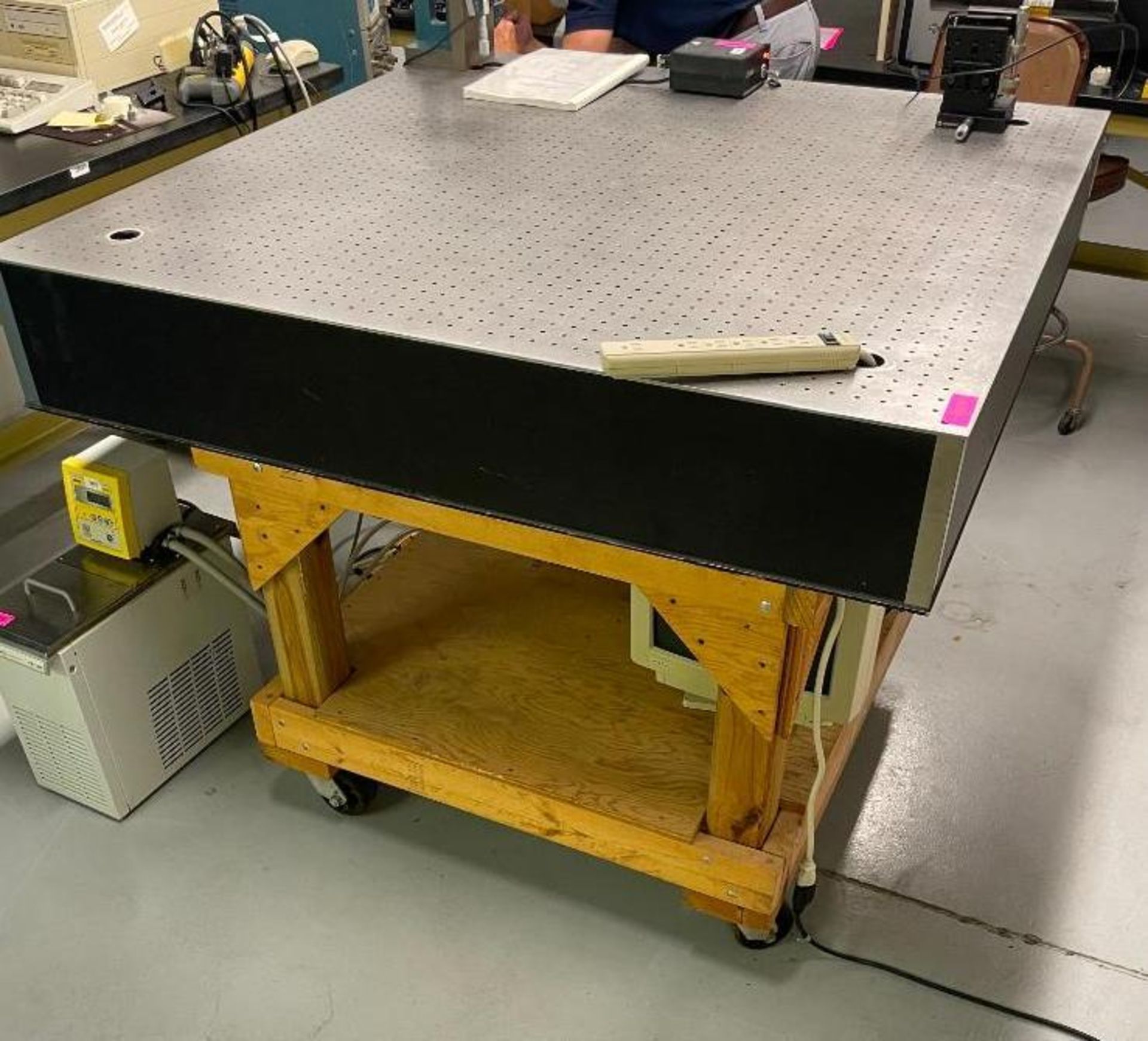 NRC LASER OPTICAL VIBRATION ISOLATION TABLE ON WOOD BASE WITH CASTERS BRAND/MODEL: NEWPORT INFORMATI