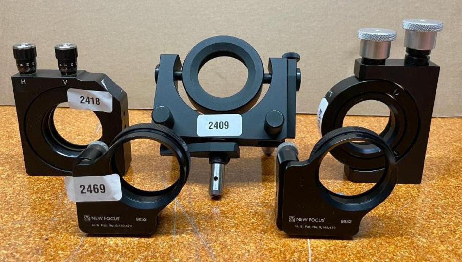 (5) ASSORTED 2" OPTIC MOUNTS BRAND/MODEL: THORLABS RETAIL$: APPROX. $1,000 ORIGINAL RETAIL FOR LOT Q