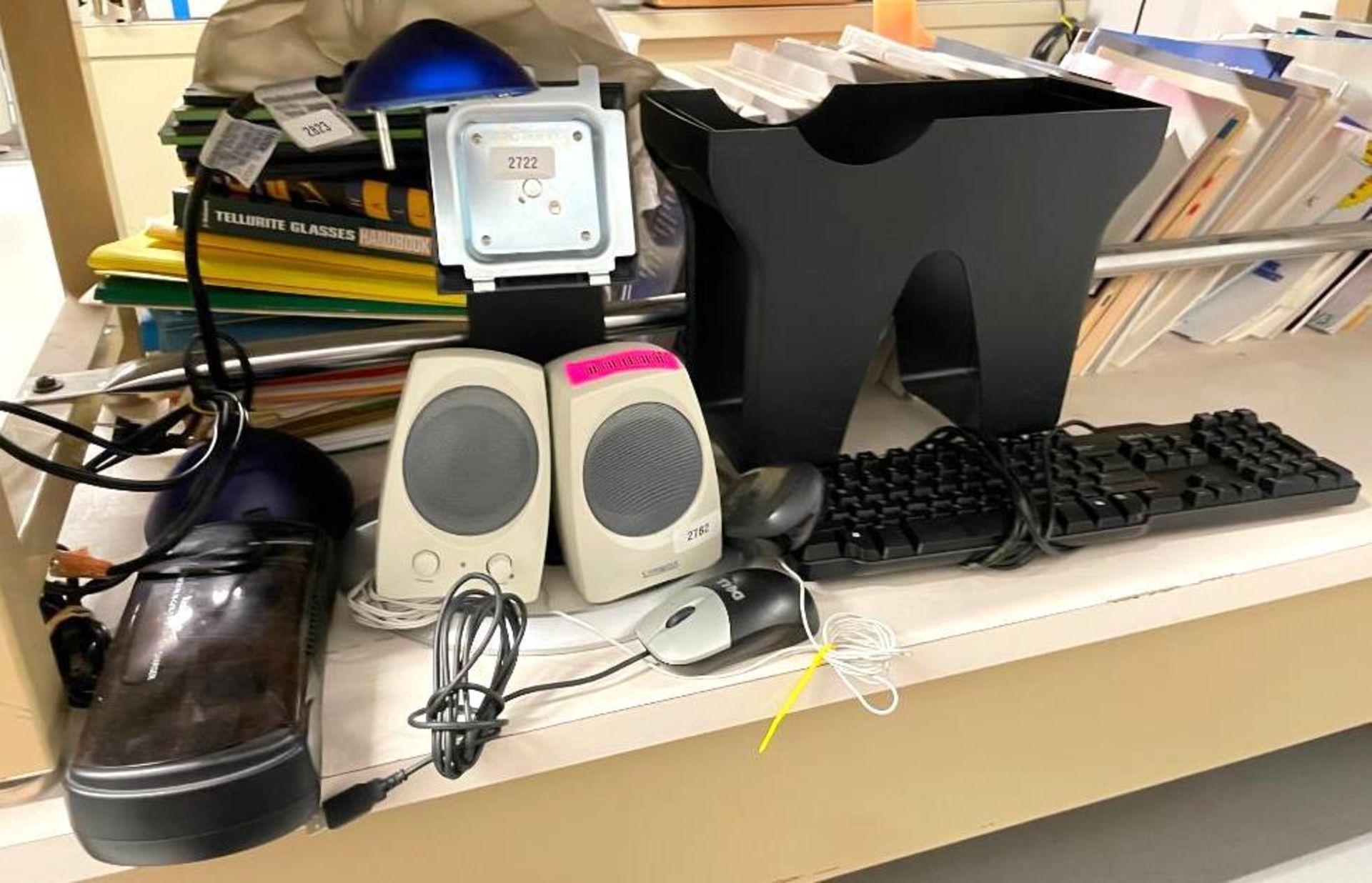 ASSORTED OFFICE SUPPLIES AS SHOWN INFORMATION: (CHARGER, SPEAKERS, DESK LIGHT, KEYBOARD, ETC.) QTY: