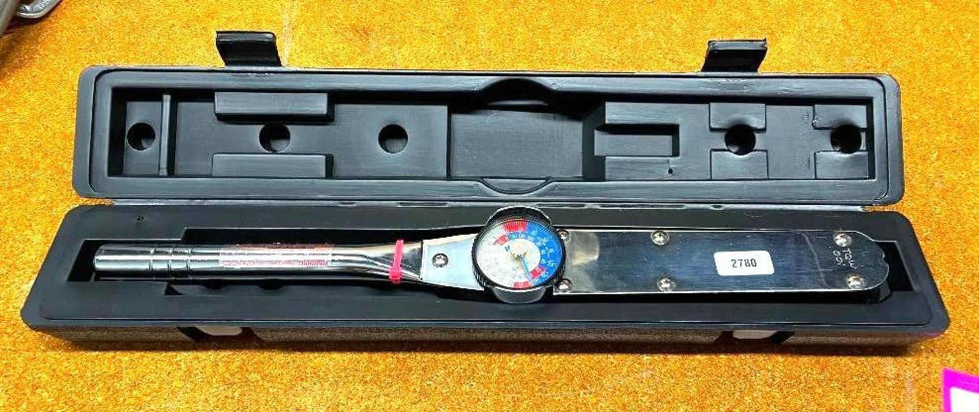 CALIBRATED 1/2" DRIVE TORQUE WRENCH IN NEWTON METERS BRAND/MODEL: CONSOLITDATED DEVICES QTY: 1