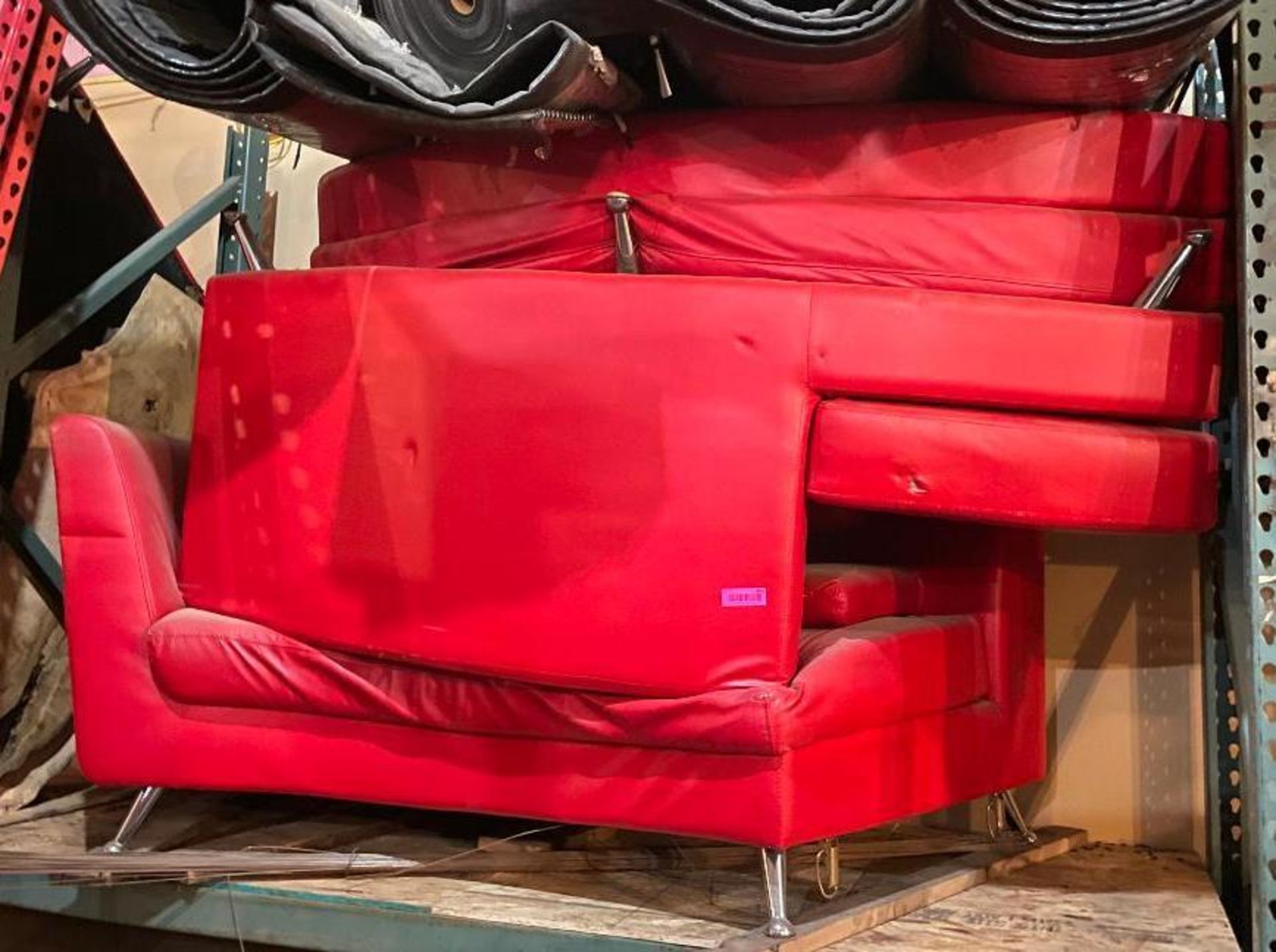 DESCRIPTION: ASSORTED RED PLEATHER COUCHES AND OTTOMANS INFORMATION: SEE PHOTOS FOR ALL PIECES LOCAT