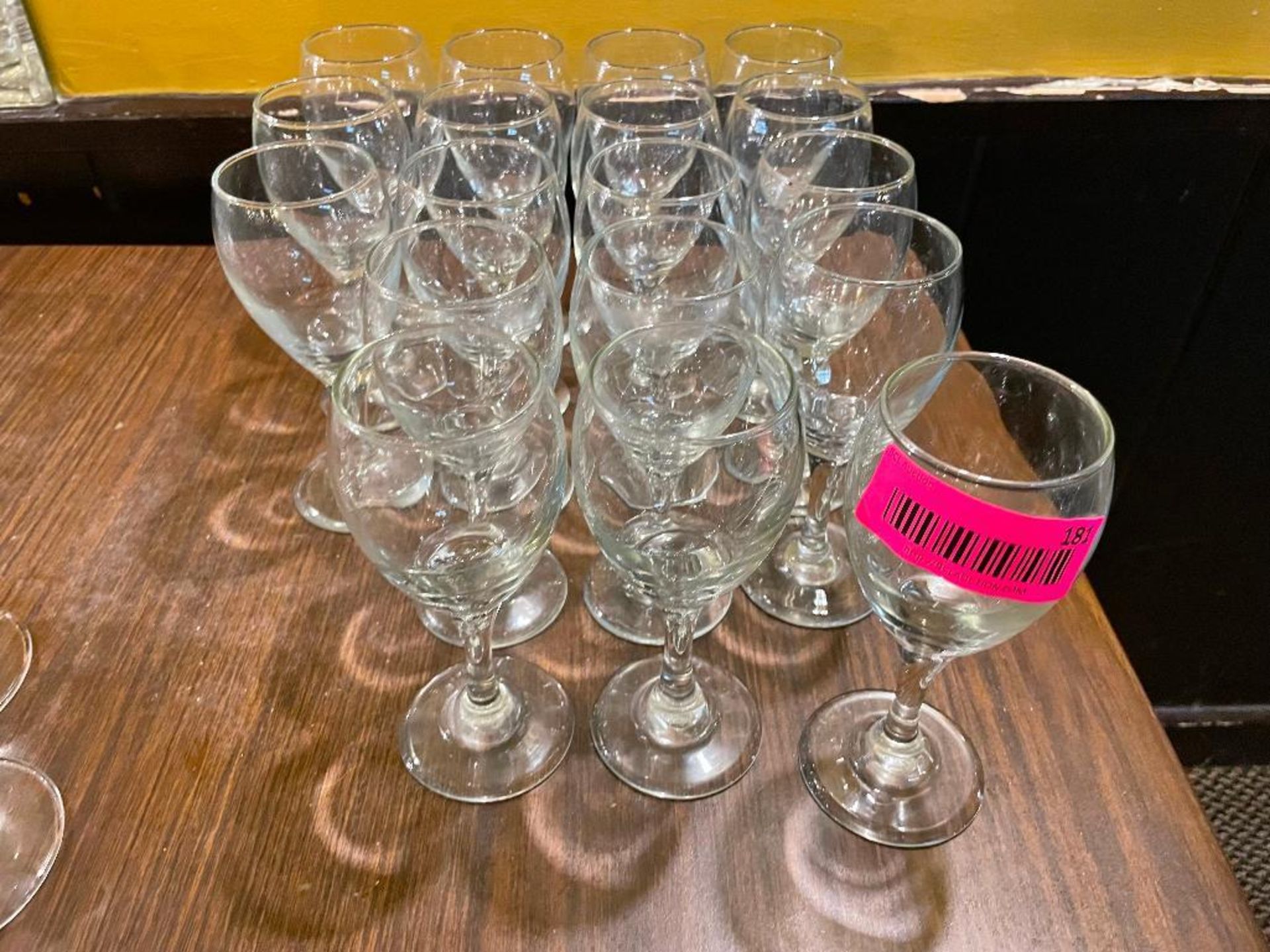 DESCRIPTION: (18) SMALL WINE GLASSES LOCATION: SEATING THIS LOT IS: SOLD BY THE PIECE QTY: 18