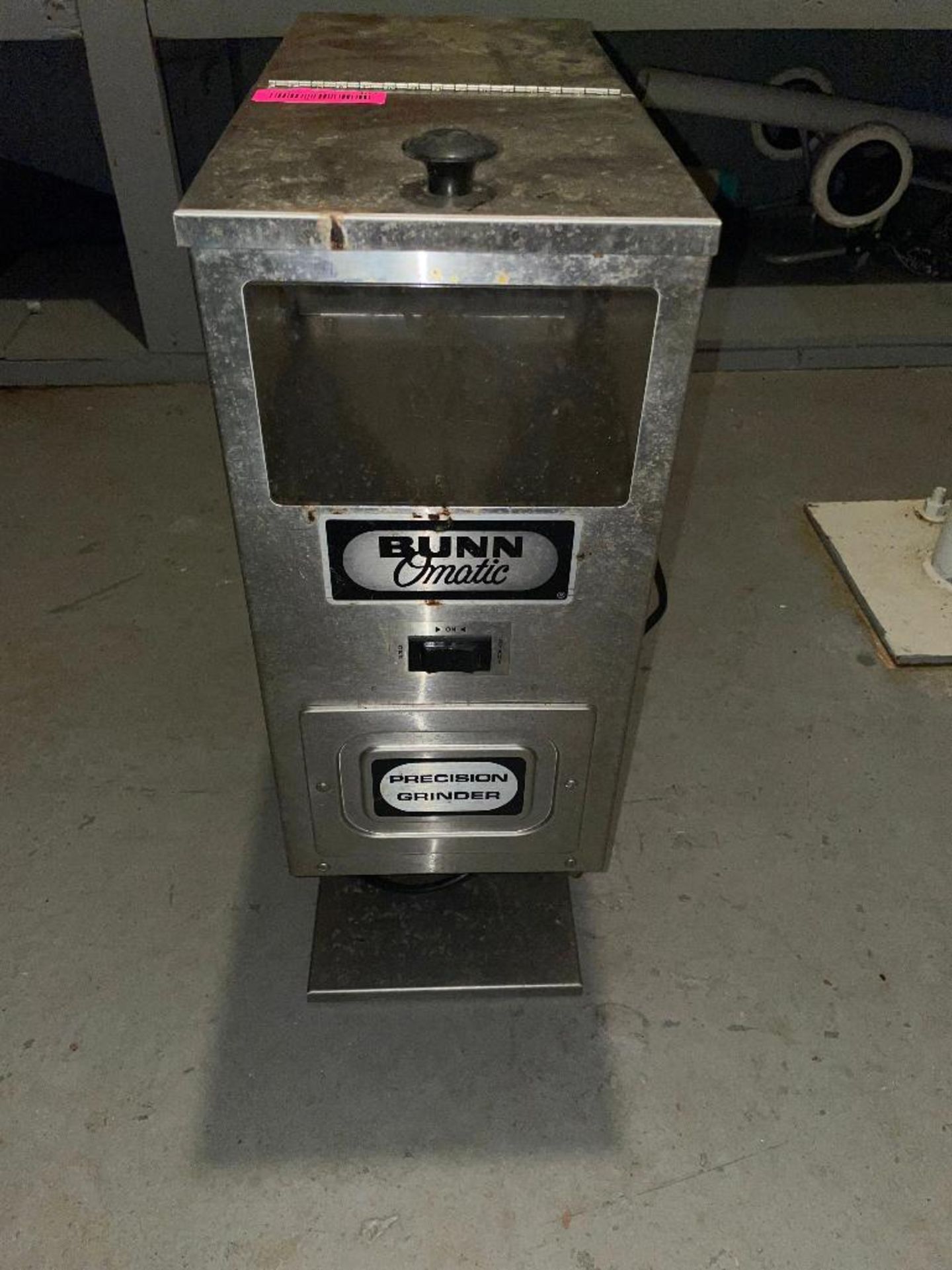 DESCRIPTION: BUNN COMMERCIAL COFFEE GRINDER BRAND / MODEL: BUNN G-9 LOCATION: BASEMENT QTY: 1