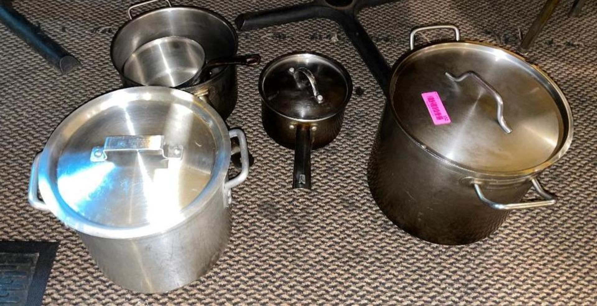 DESCRIPTION: (4) ASSORTED STAINLESS STOCK POTS AND SAUCE POTS LOCATION: SEATING THIS LOT IS: ONE MON