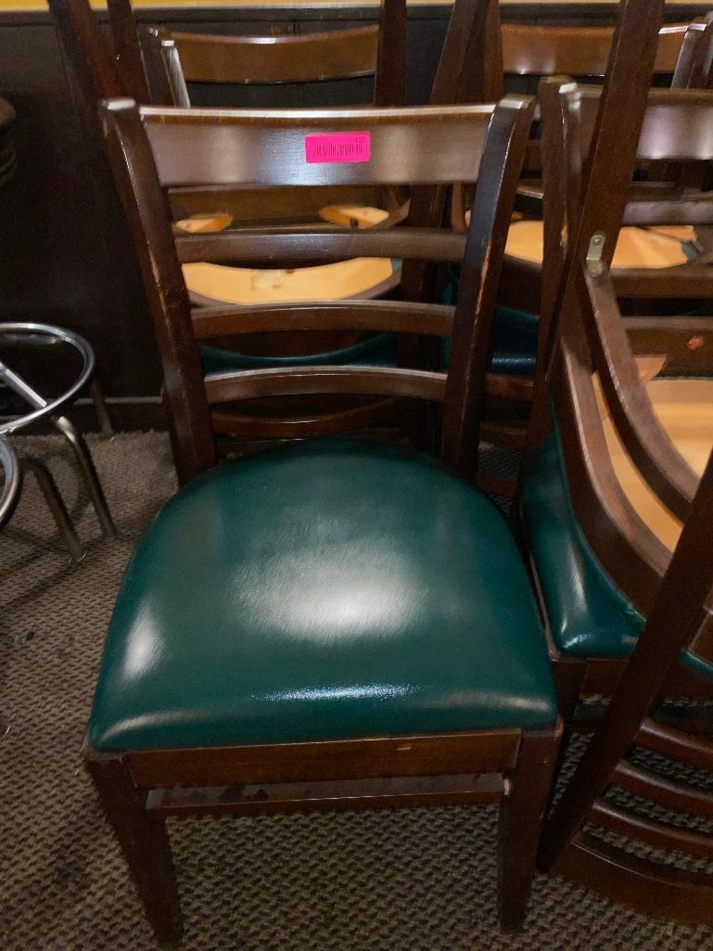 DESCRIPTION: (24) LADDER BACK WOODEN CHAIRS W/ GREEN VINYL SEAT CUSHIONS LOCATION: SEATING THIS LOT - Image 2 of 3