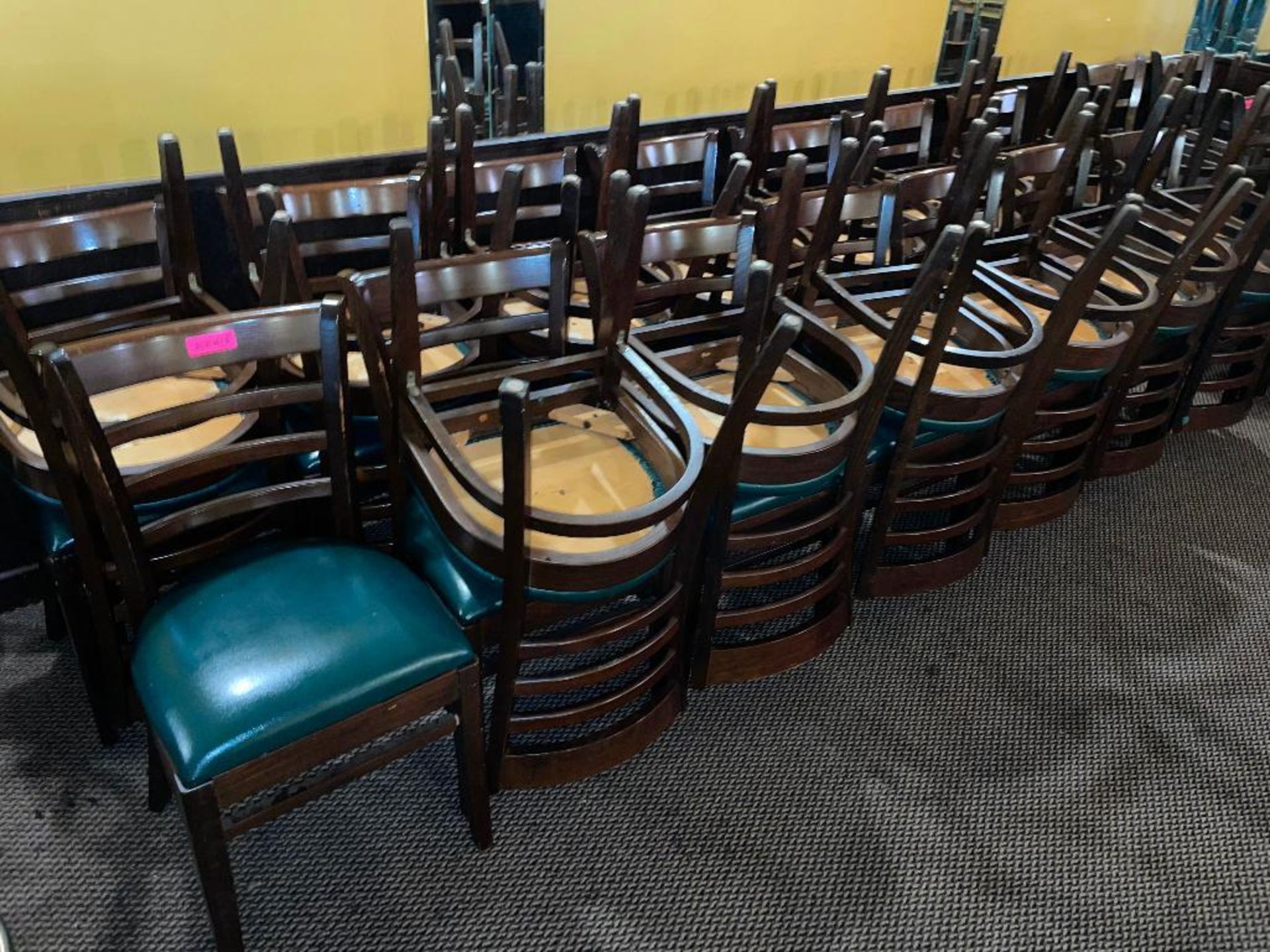 DESCRIPTION: (24) LADDER BACK WOODEN CHAIRS W/ GREEN VINYL SEAT CUSHIONS LOCATION: SEATING THIS LOT - Image 3 of 3