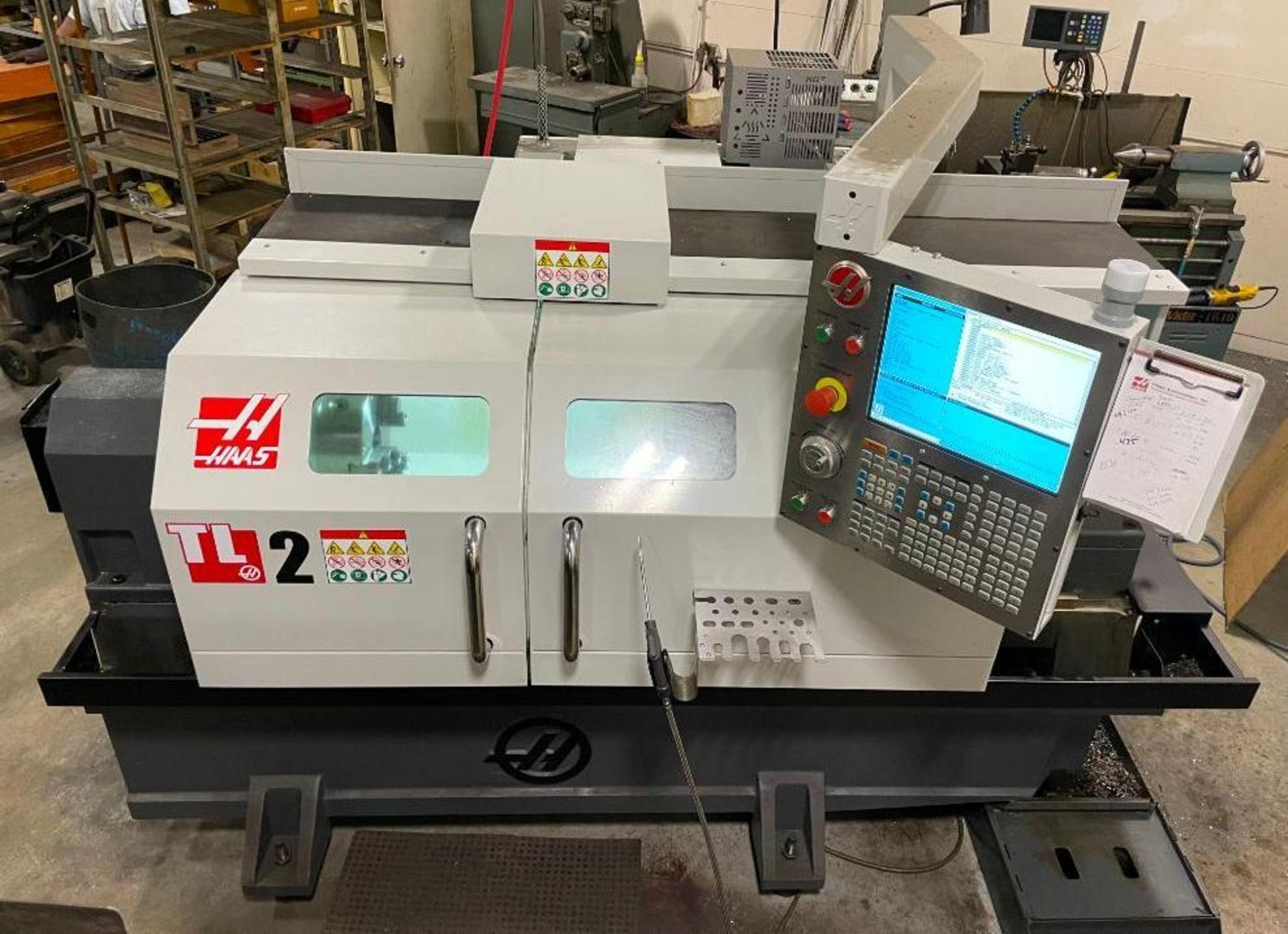2016 HAAS TL-2 CNC LATHE INFORMATION: 220V, 3 PHASE, POWER ON HRS: 2980, CYCLE START HRS: 557, FEED