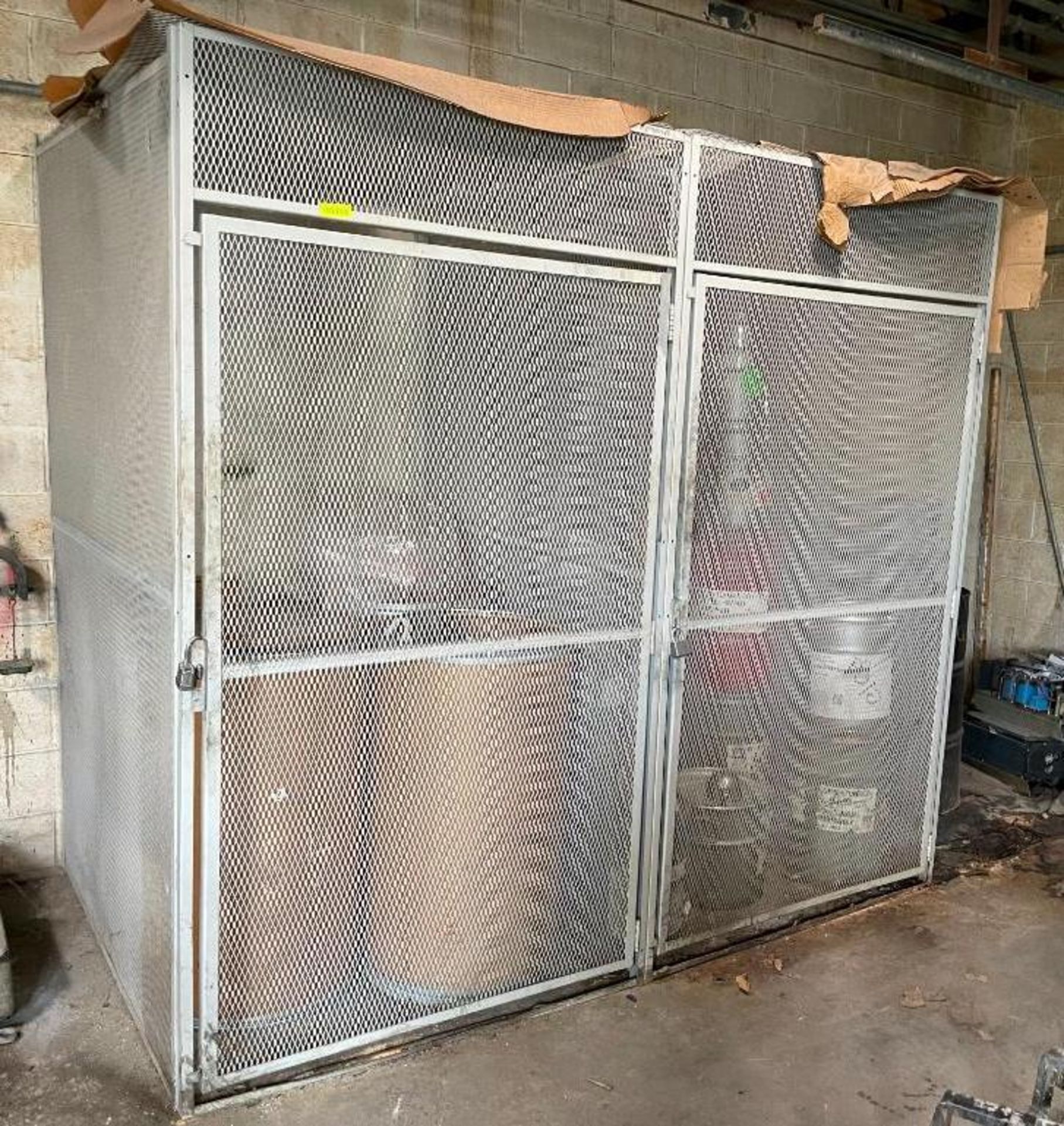 (2) LOCKING STORAGE CAGES SIZE: 5'X8'X90" LOCATION: BACK MIXER ROOM QTY: 2