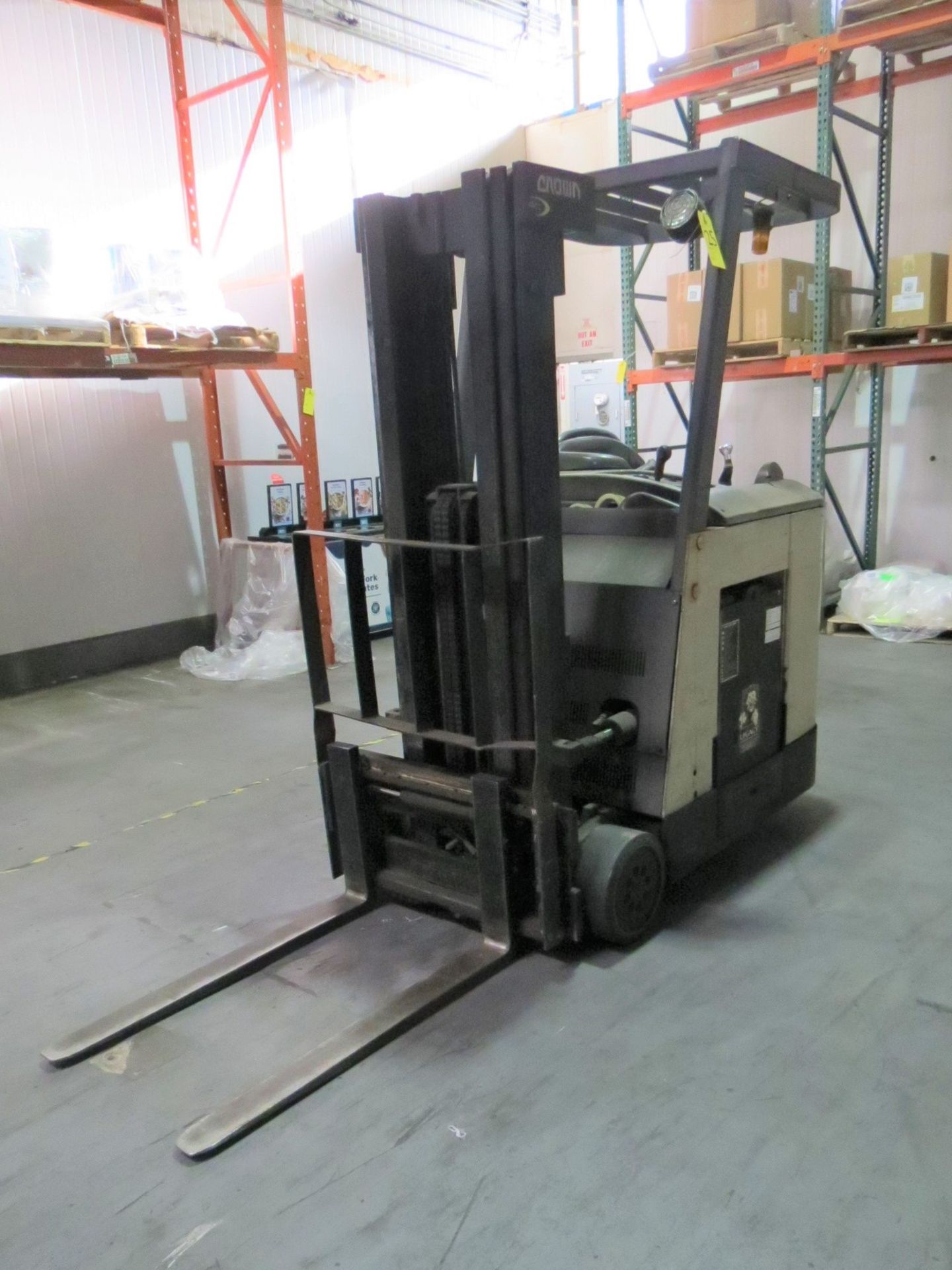 Crown 3000 Series Electric Stand up Forklift, SN: 1A288127 with Trojan ll Battery Charger