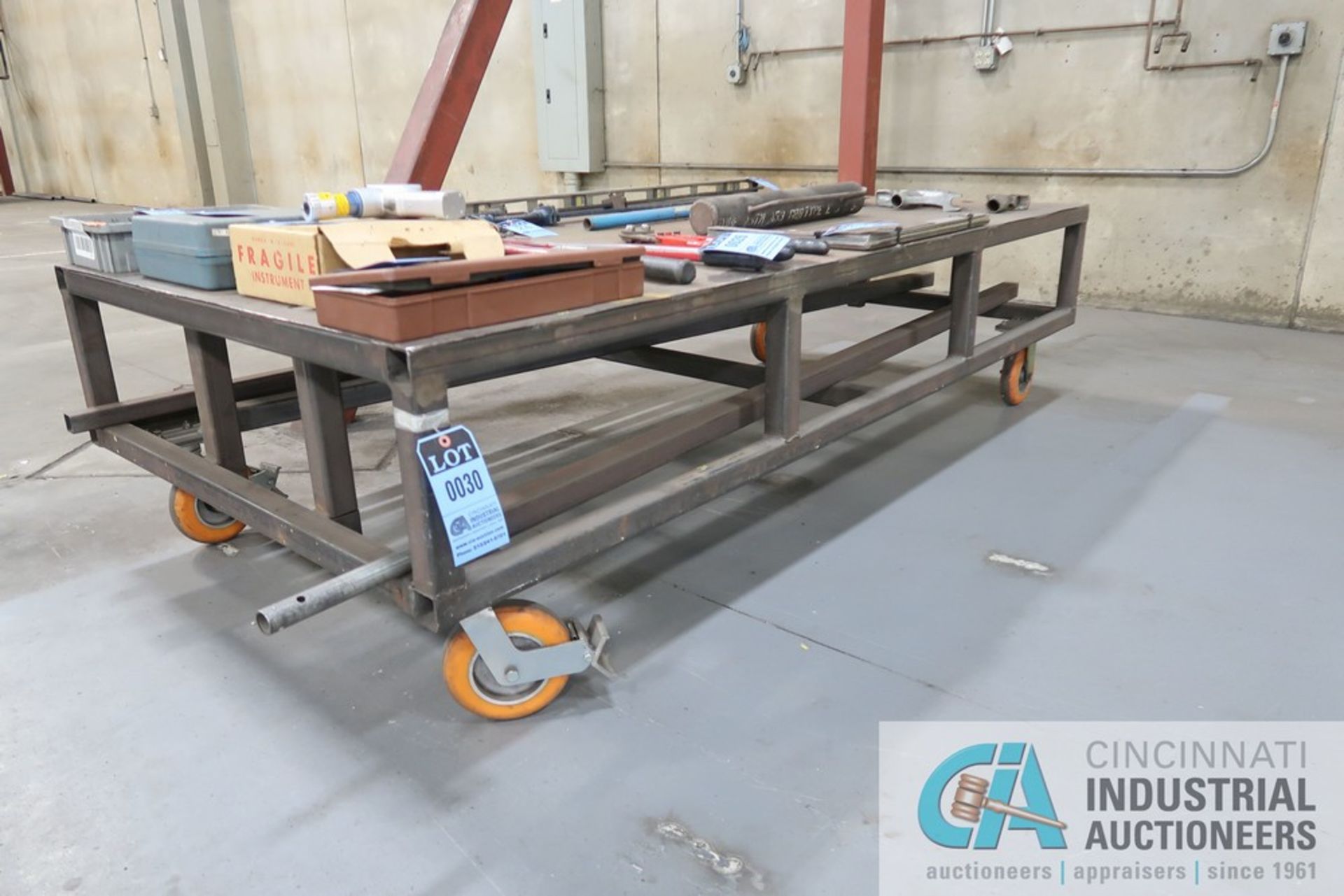 48" X 96" X 25" HIGH HEAVY DUTY WELDED PORTABLE STEEL TABLE **DELAYED REMOVAL UNTIL 12/27/2021**