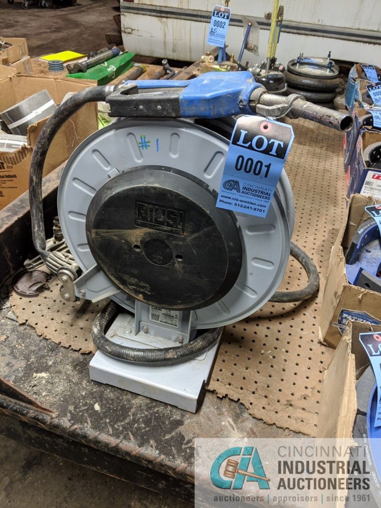 FUEL HOSE ON REEL WITH AMOR BLUE ELECTRIC PUMP **LOCATED AT 128 STEUBENVILLE AVE., CAMBRIDGE, OHIO