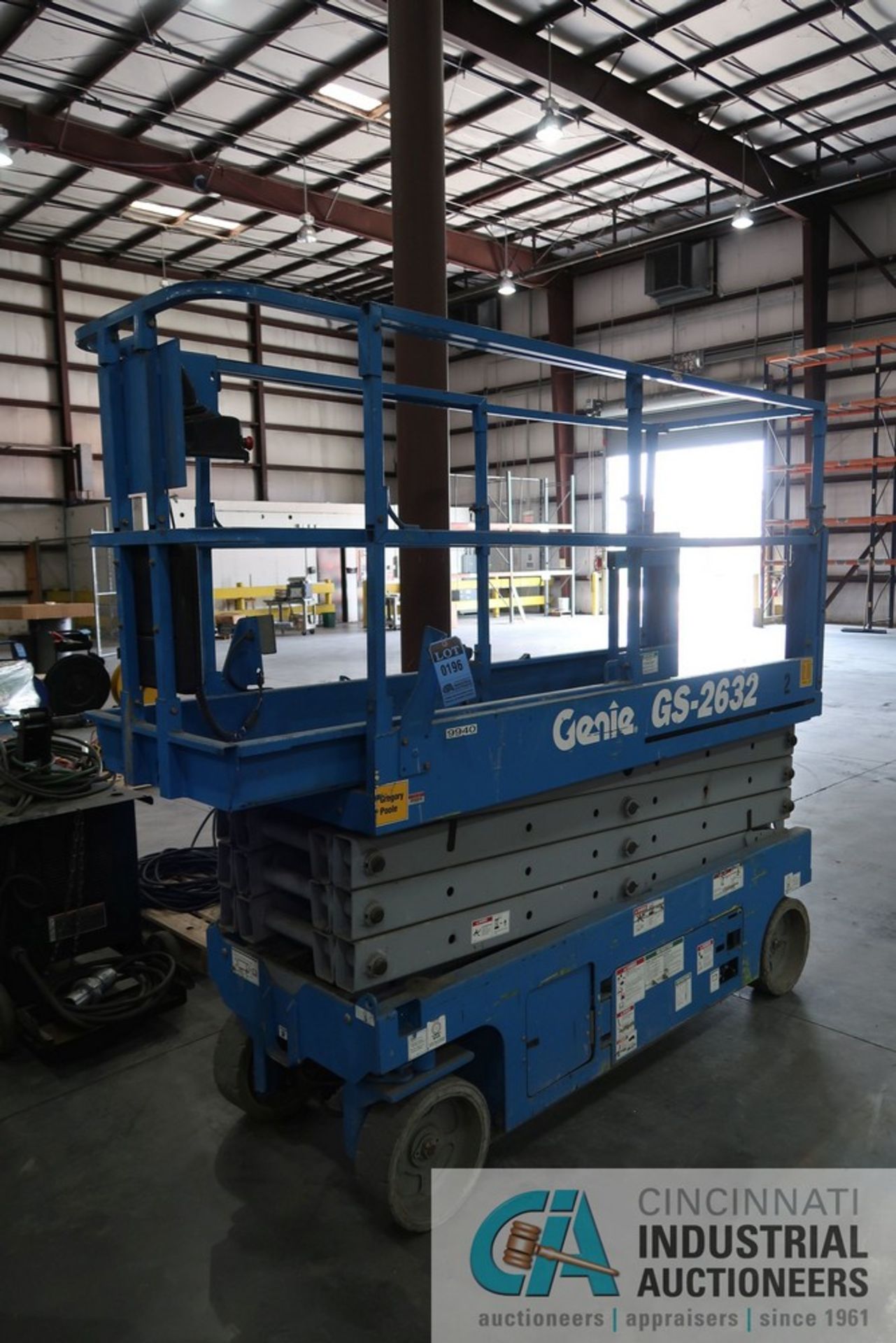 GENIE MODEL GS-2632 24 VOLT AERIAL WORK PLATFORM; S/N GS3208-089940 WITH BUILT-IN BATTERY CHARGER *