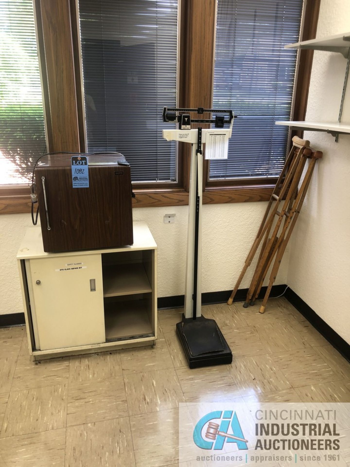 CONTENTS OF MEDICAL OFFICE: PATIENT BED; MINI REFRIGERATOR; CRUTCHES; FLOOR SCALE; TITMUS VISION - Image 3 of 11