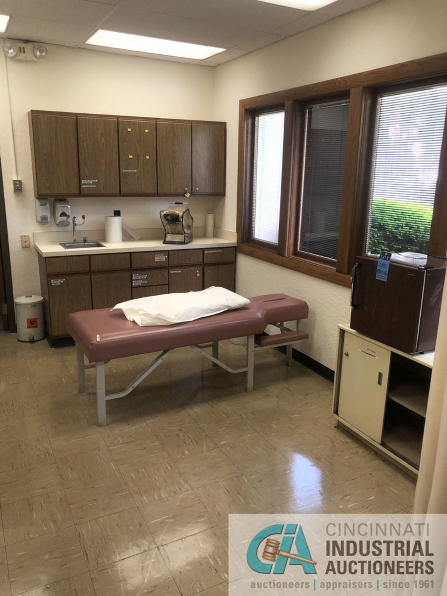 CONTENTS OF MEDICAL OFFICE: PATIENT BED; MINI REFRIGERATOR; CRUTCHES; FLOOR SCALE; TITMUS VISION