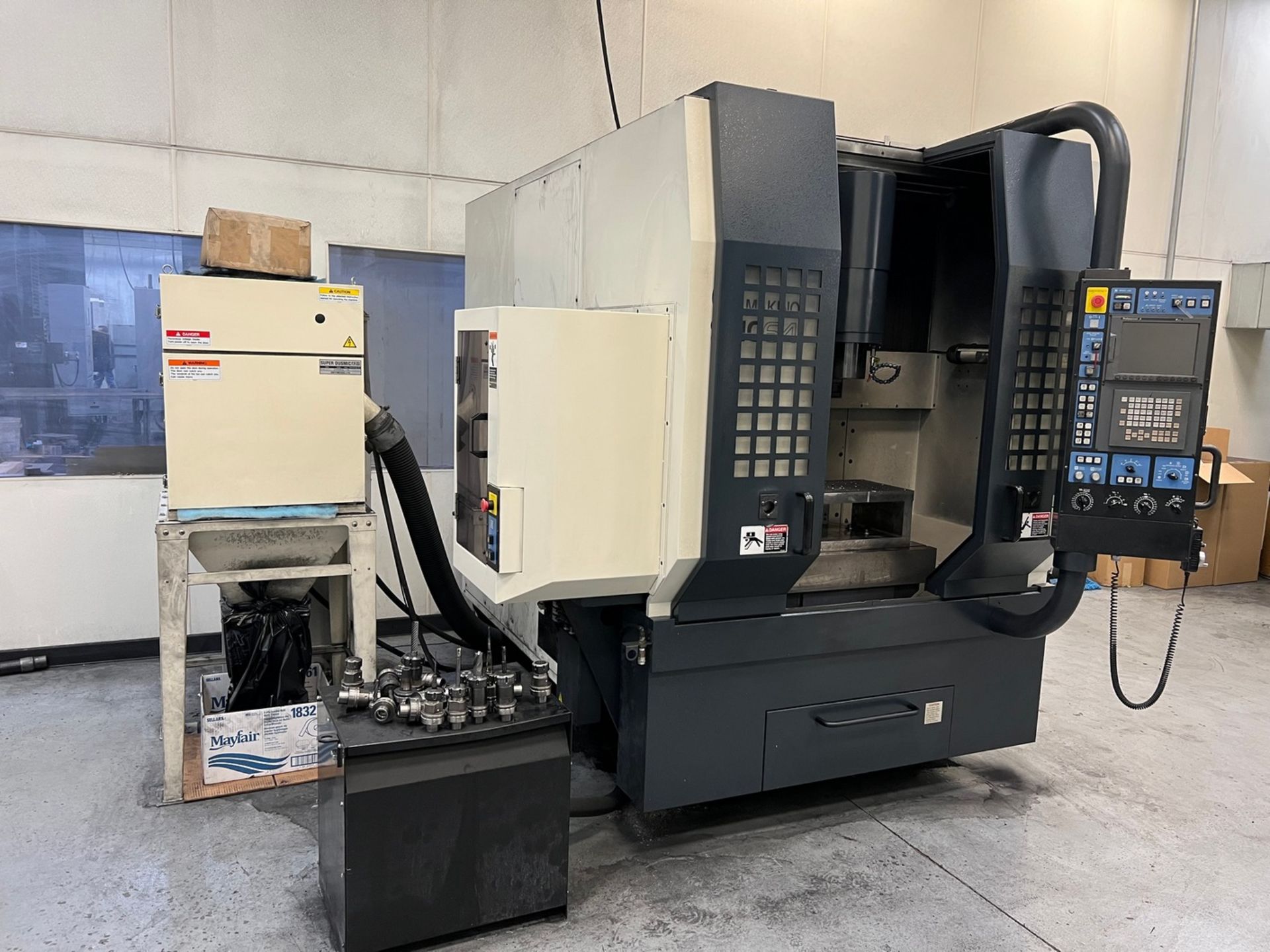 MAKINO MODEL SNC64 CNC GRAPHITE VERTICAL MILLING MACHINE; S/N 04-737-10 (NEW 2005), 16" X 30" TABLE,