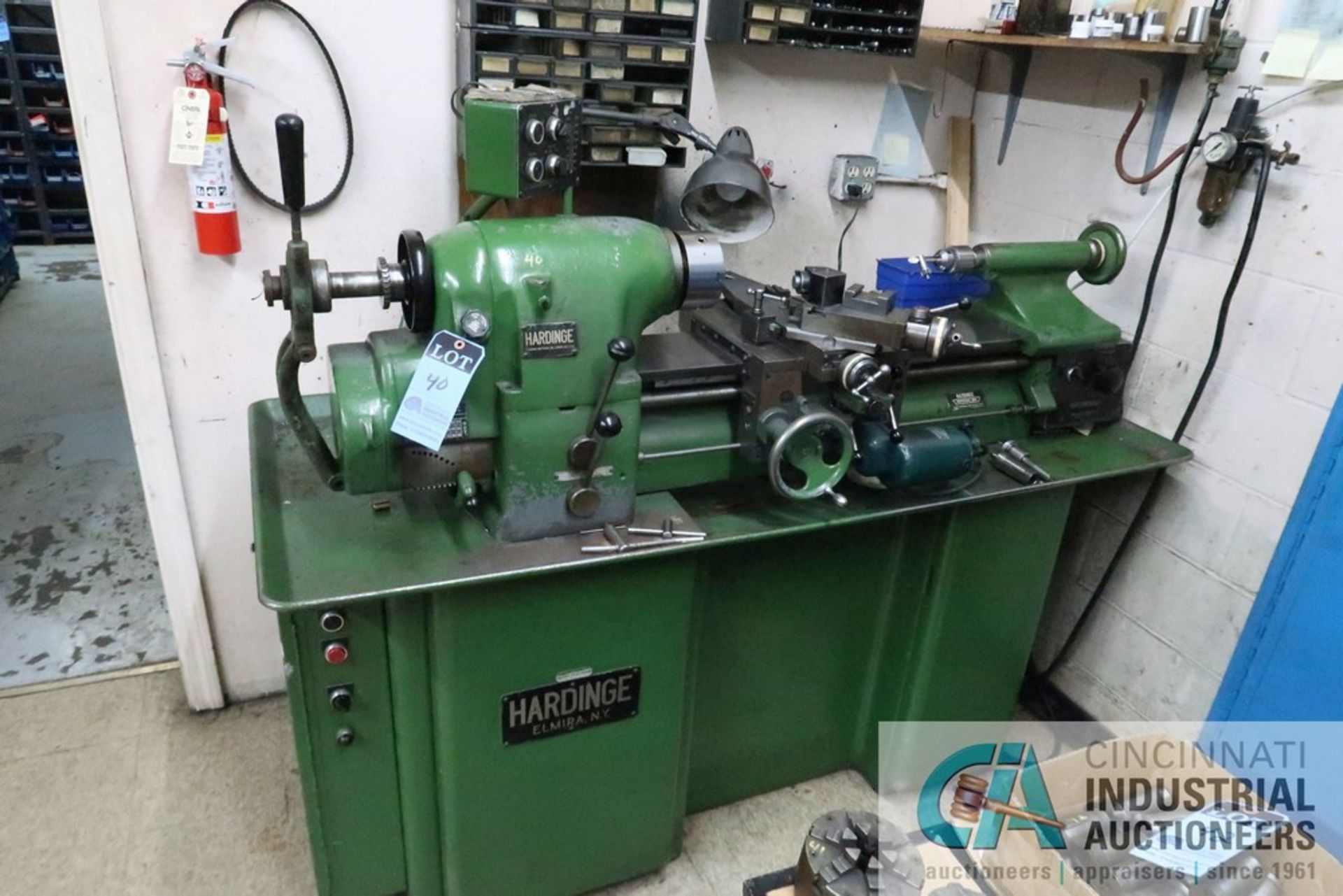 HARDINGE MODEL HLV-H TOOLROOM LATHE, 5" 3-JAW CHUCK, TAILSTOCK WITH TOOLING ON SHELF UNIT BEHIND