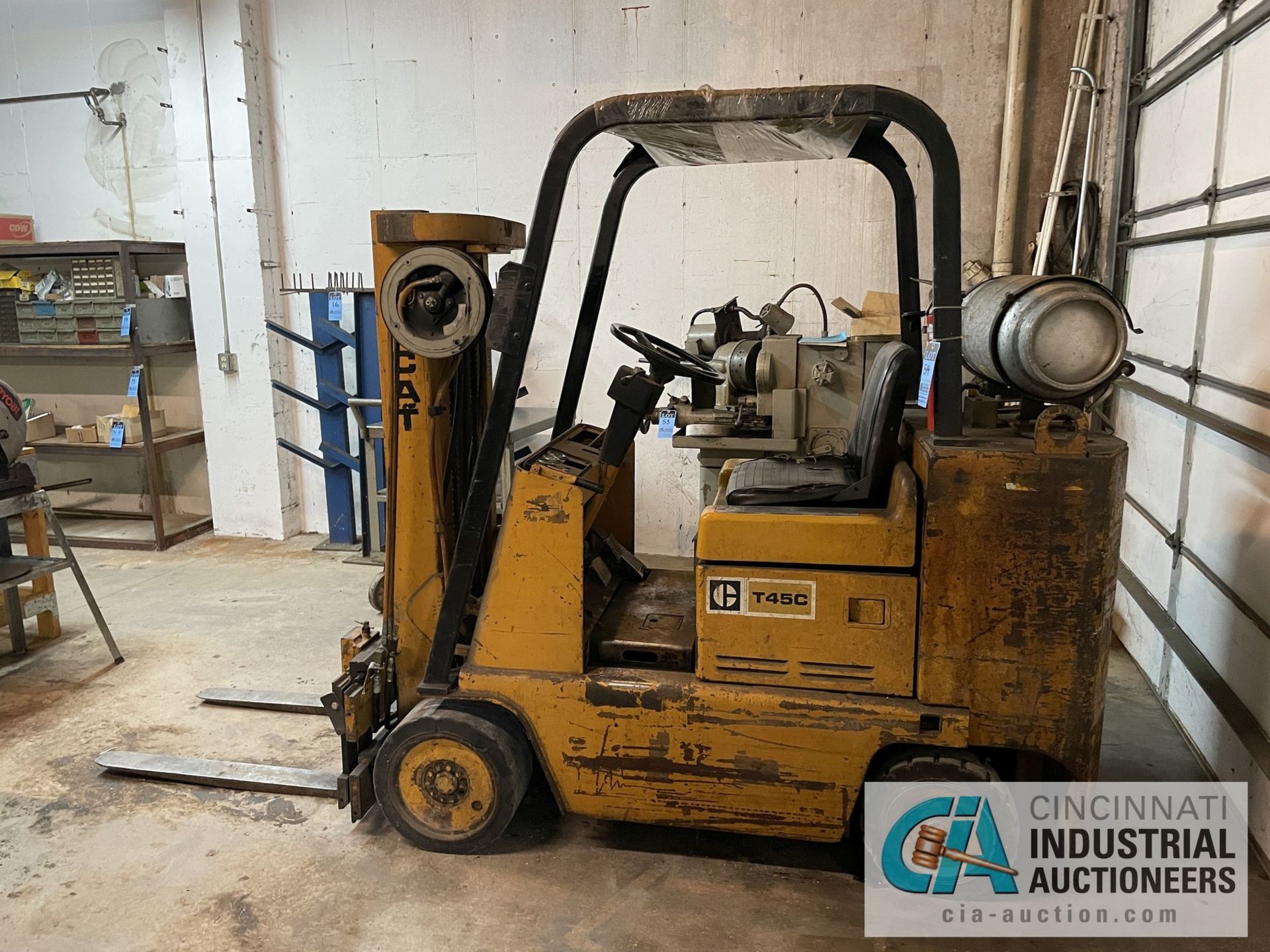 4,500 LB. CAPACITY CATERPILLAR MODEL T45C LP GAS TWO-STAGE SOLID TIRE FORKLIFT; S/N 38Y1543P, 64" - Image 2 of 10