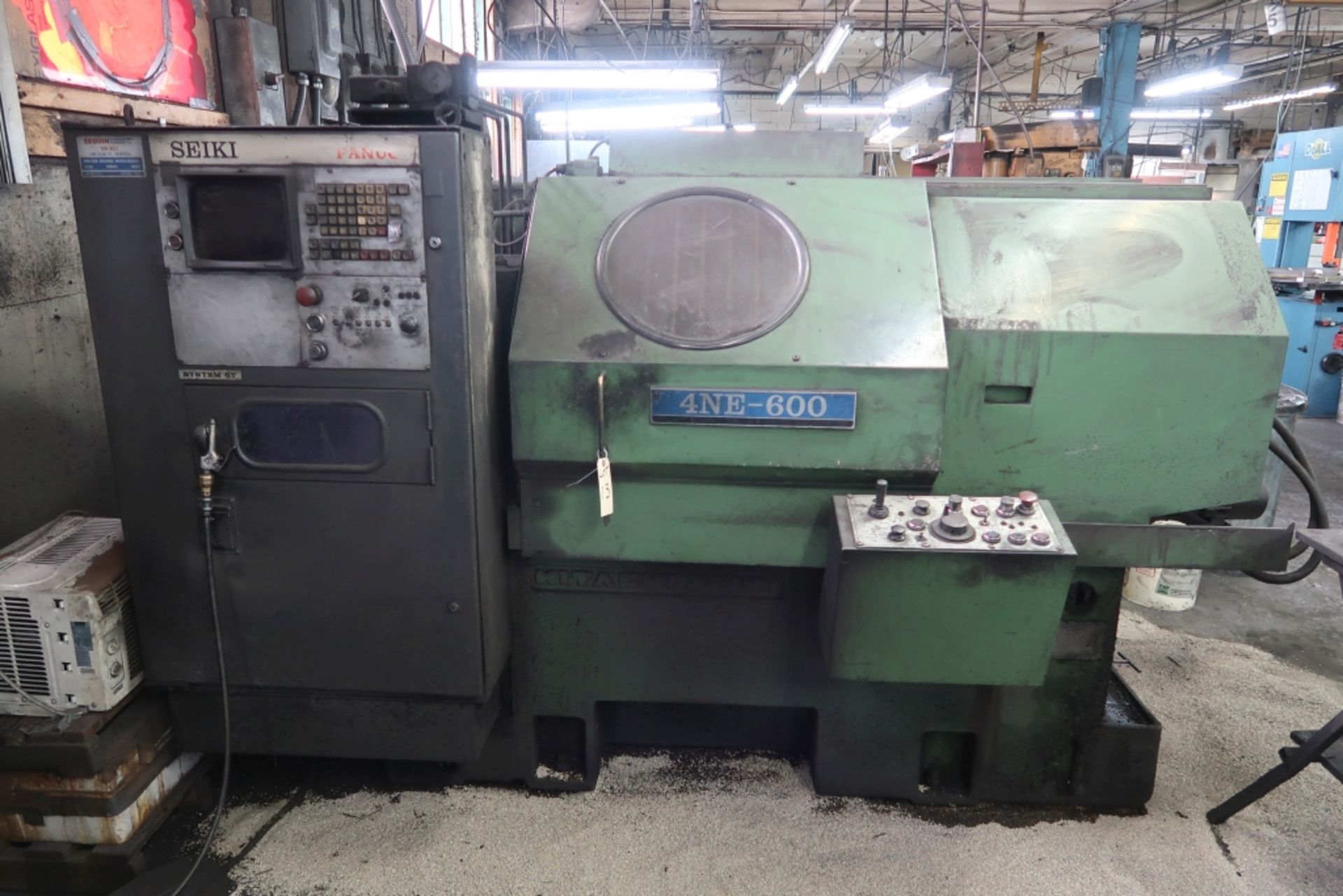 HITACHI SEIKI CNC TURNING CENTER MOD: 4NE-600, FANUC SYSTEM 6T CONTROL, 12 POSITION TOOL TURRET,