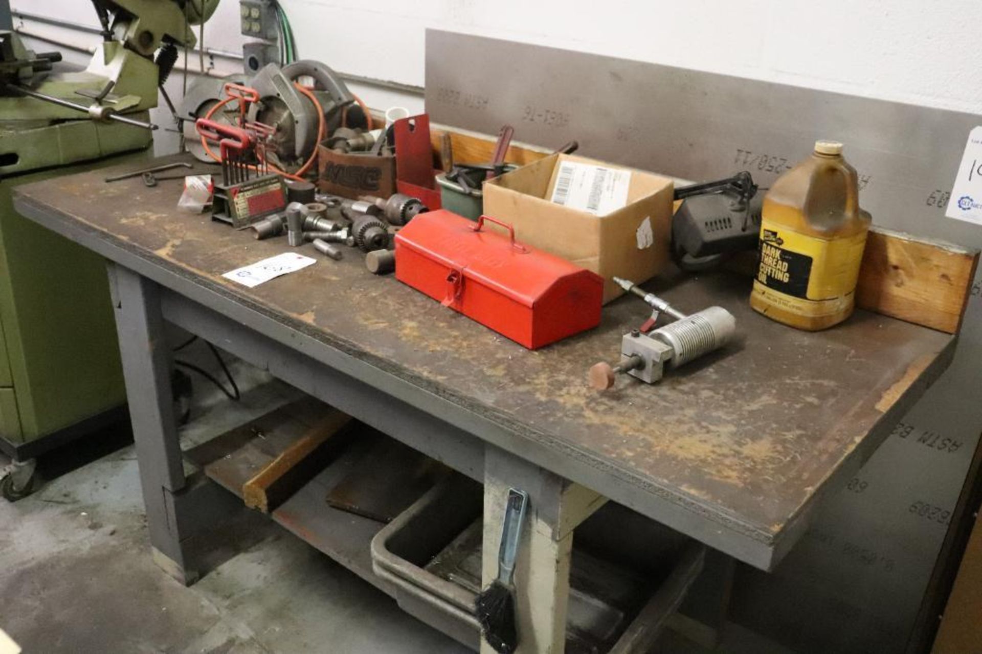 Wooden work bench with contents