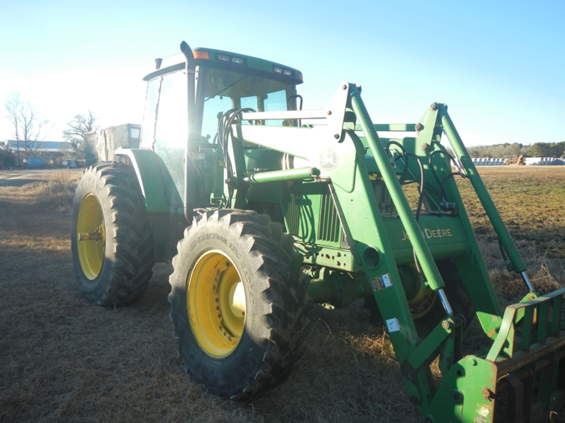 JD 7400 cab, 4wd, power quad, w/JD 740 classic loader and forks ?10,031 hours?