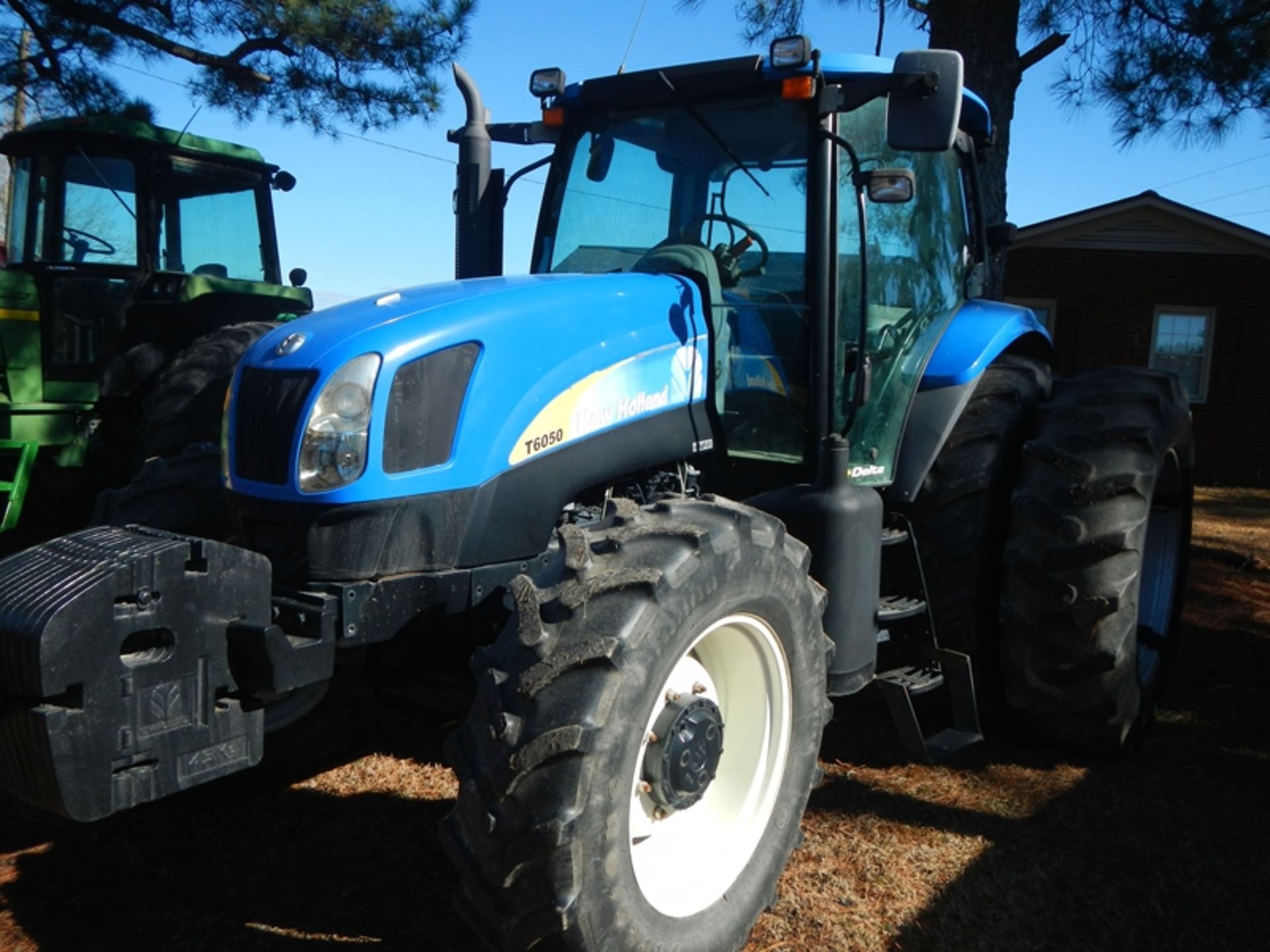 New Holland T6050 snap on duals, weights, 3094 hours,
